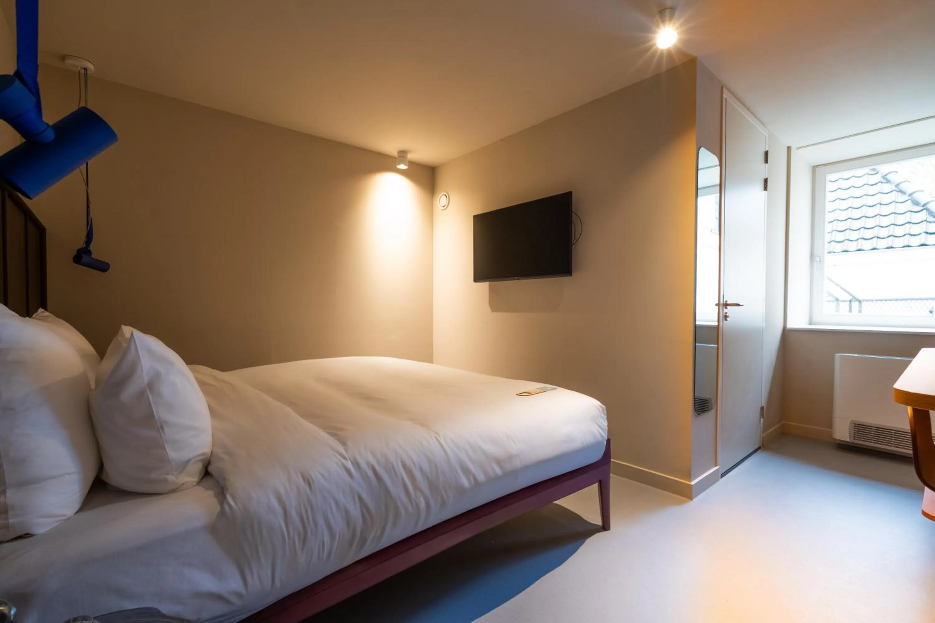 Bed in Conscious Hotel Oudegracht