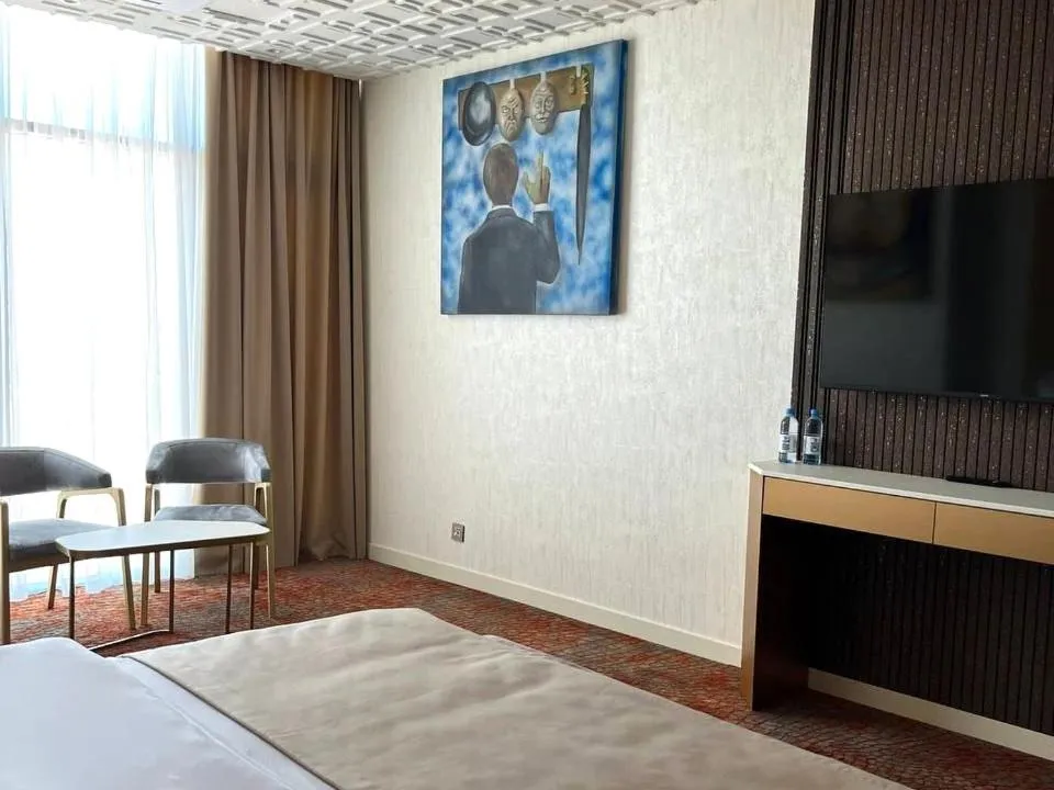 Communal lounge/ TV room, Bed in Carat Hotel Yerevan