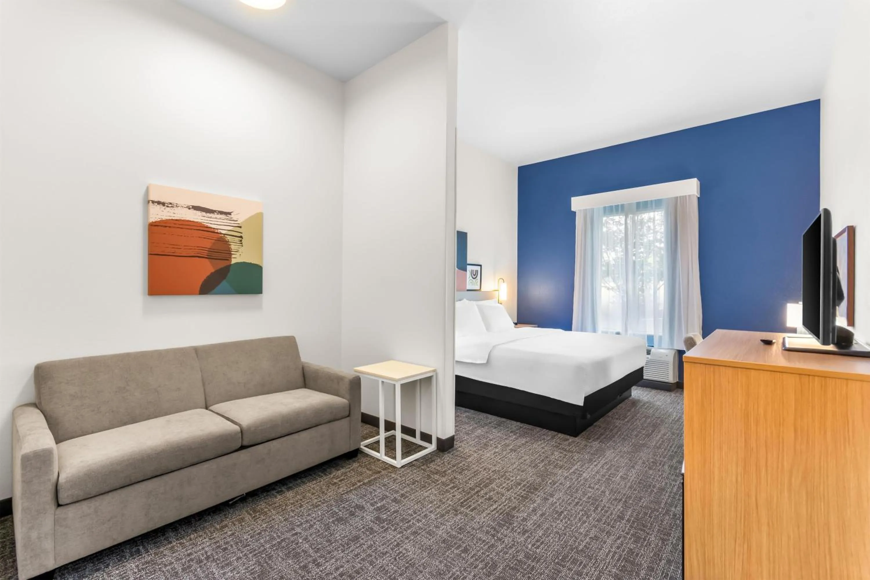 Living room, Bed in Spark by Hilton Dothan