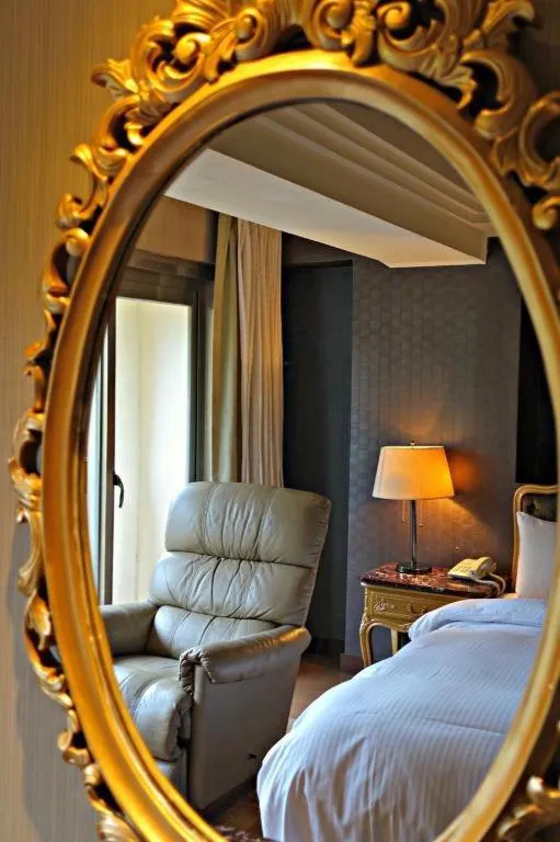 Bed in JBG Hotspring Resort Hotel