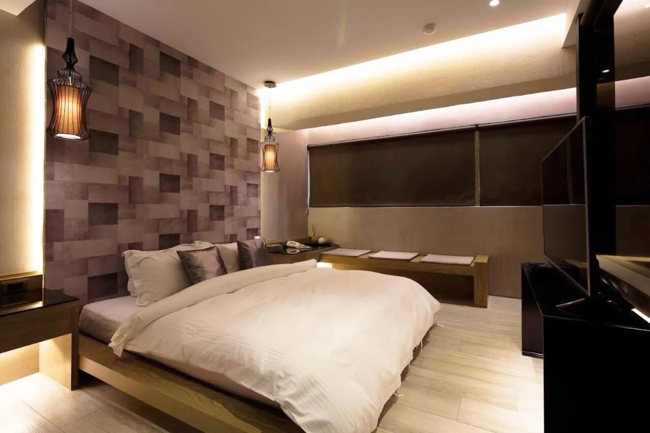 Bed in JBG Hotspring Resort Hotel