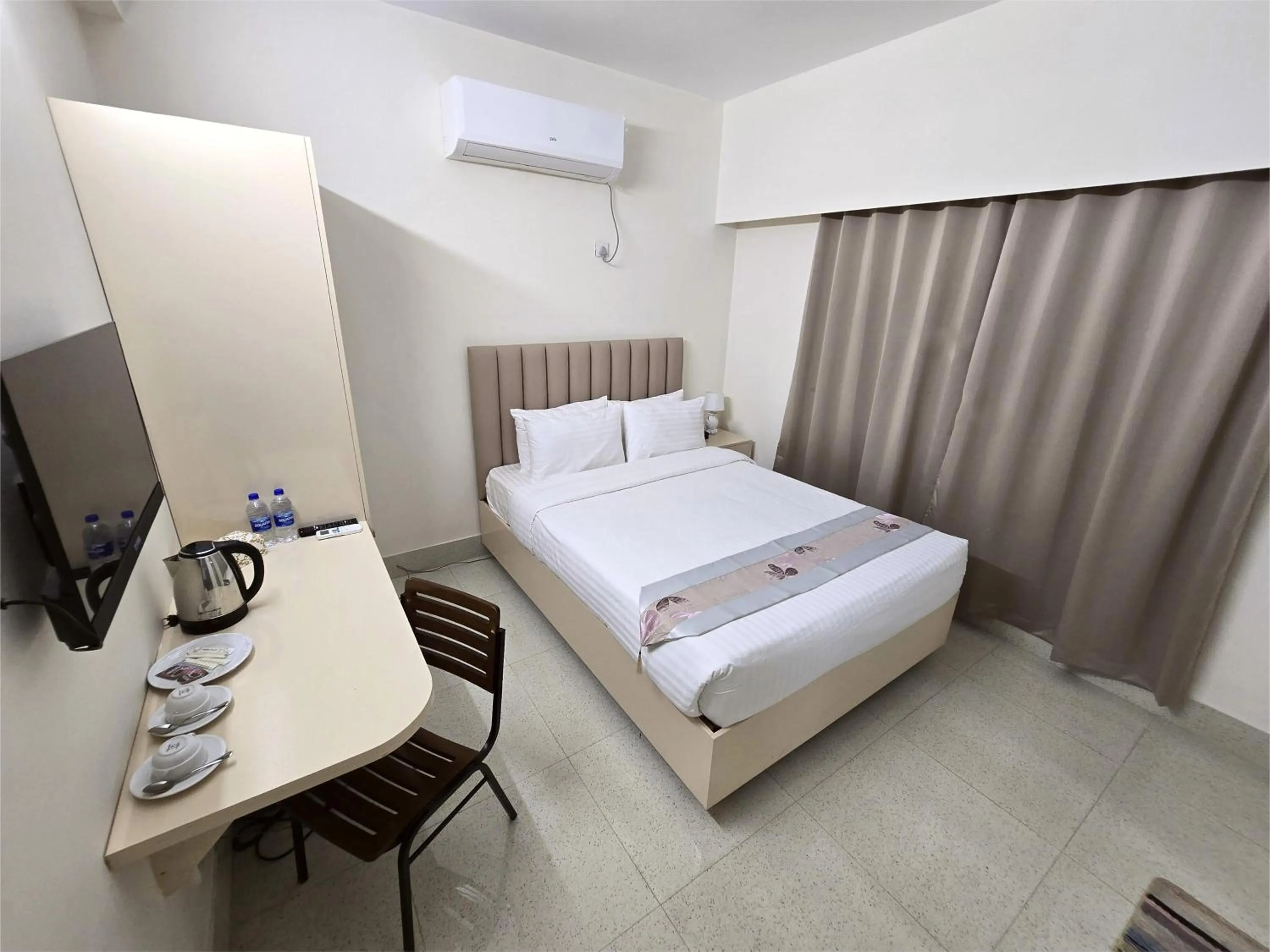 Photo of the whole room, Bed in Royal Regent Suites Dhaka