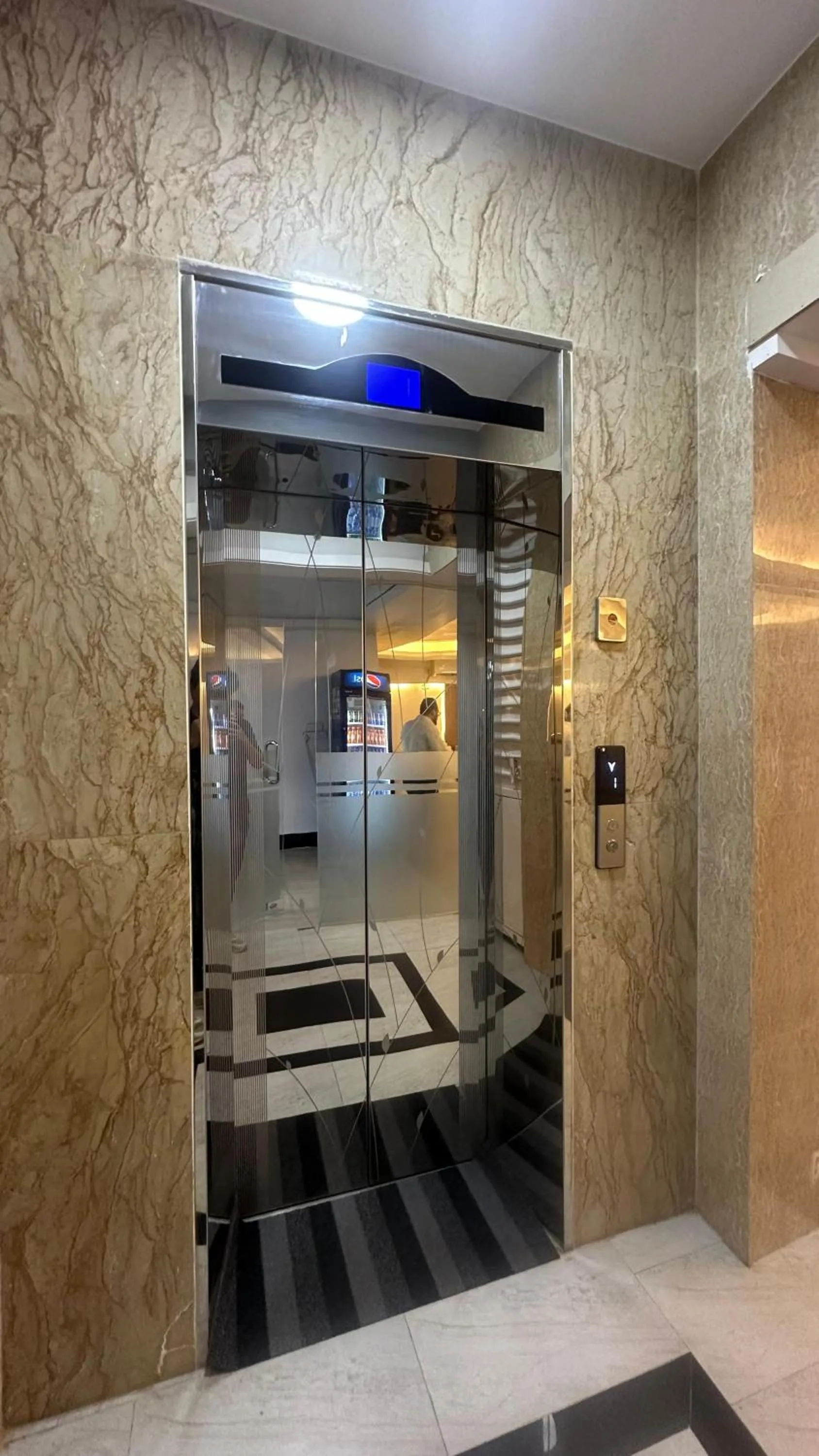 elevator in Royal Regent Suites Dhaka