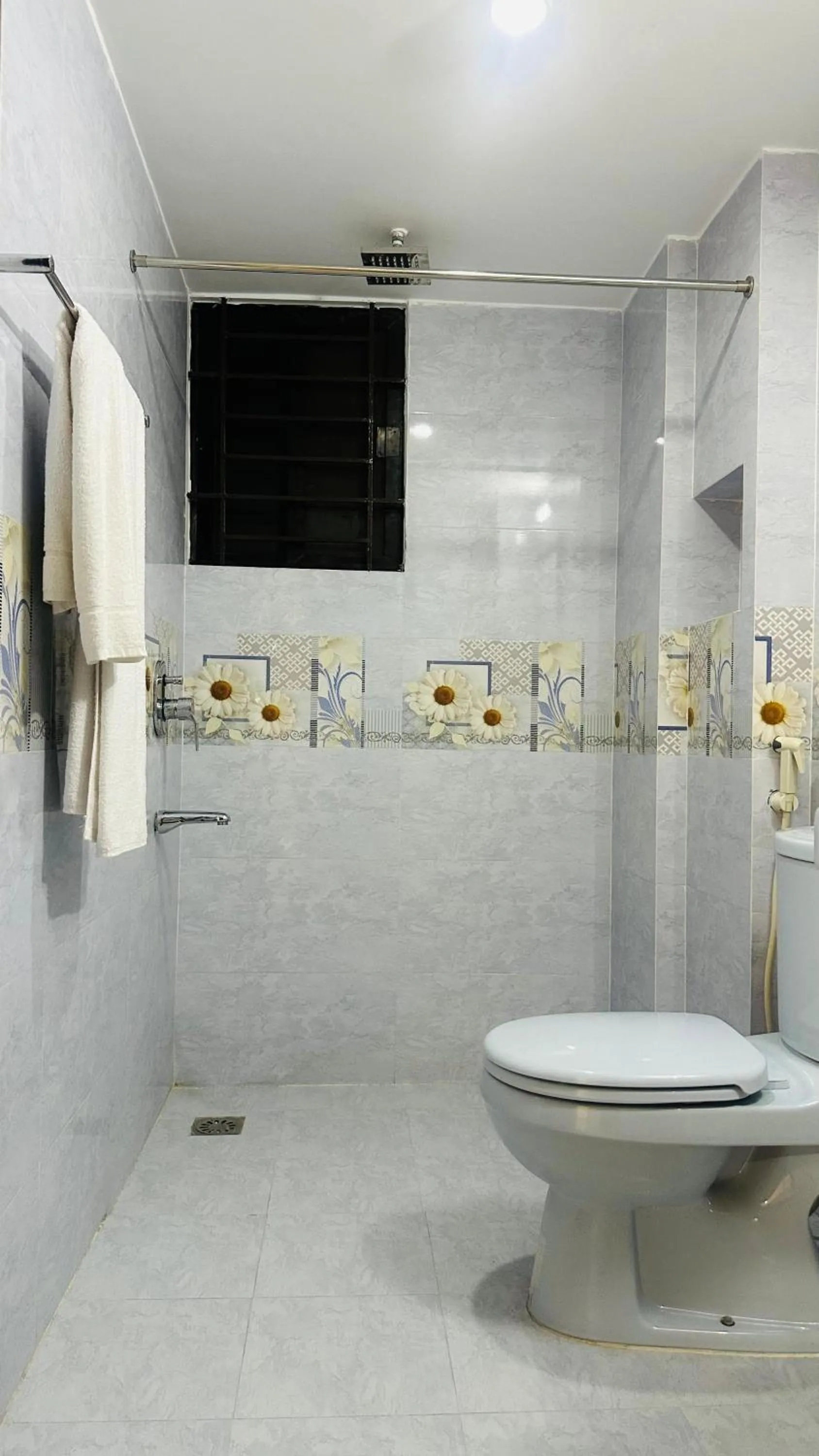 Toilet in Royal Regent Suites Dhaka