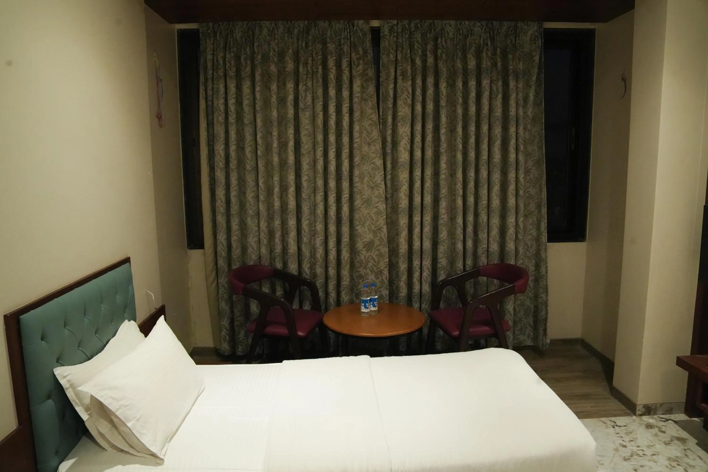 Photo of the whole room, Bed in Hotel Yashoda