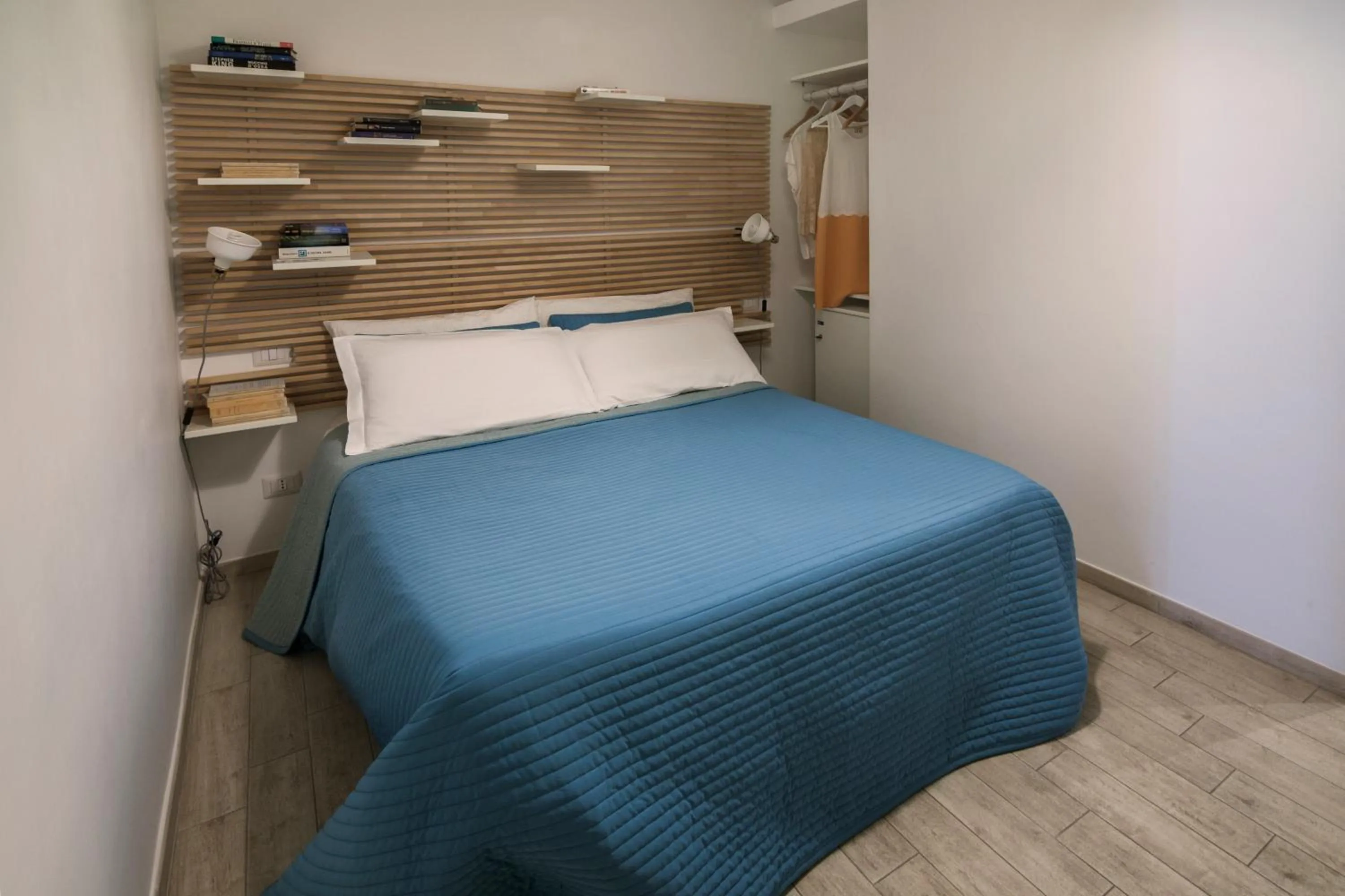 Photo of the whole room, Bed in Room of Arts