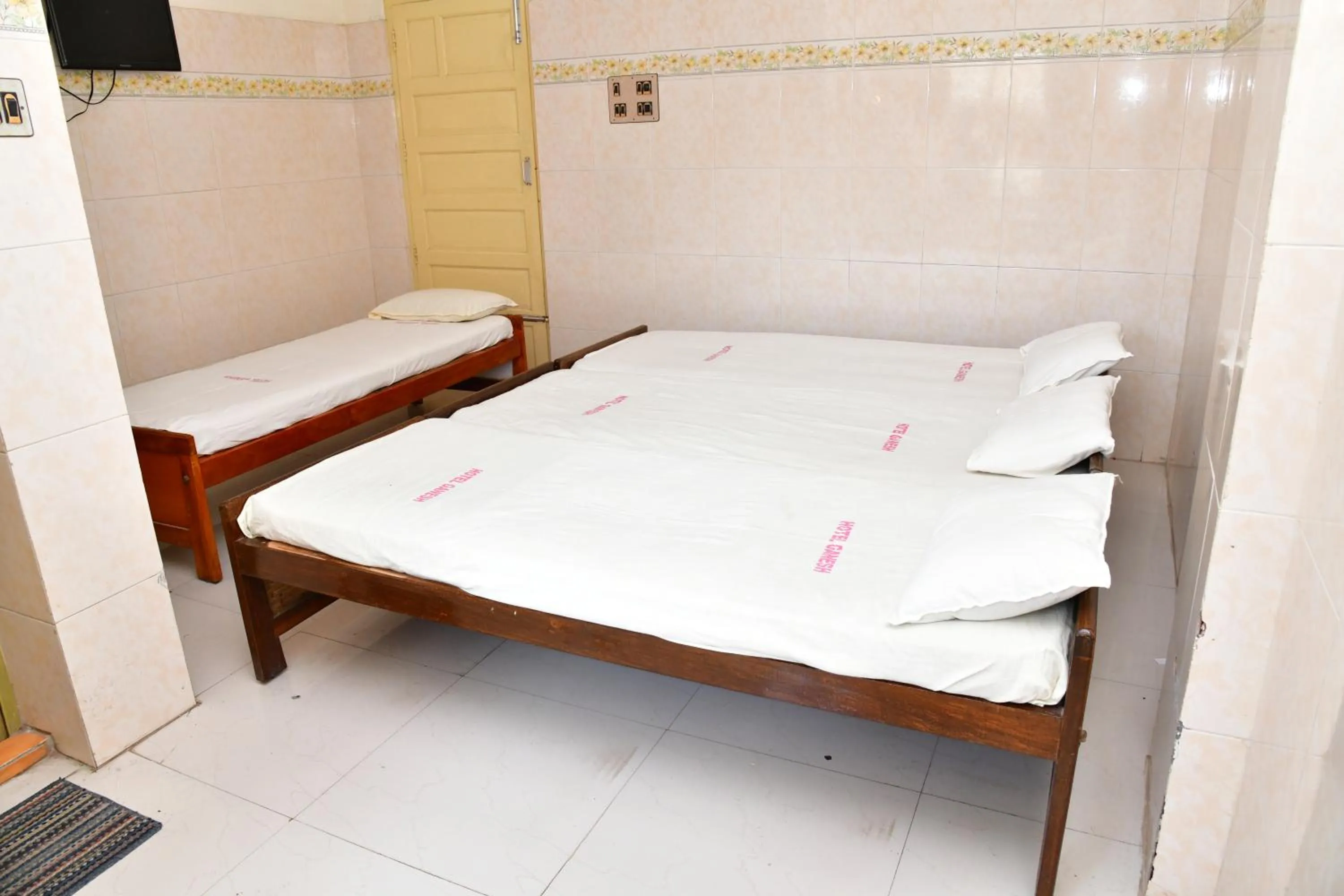 Bed in Hotel Ganesh Lodge