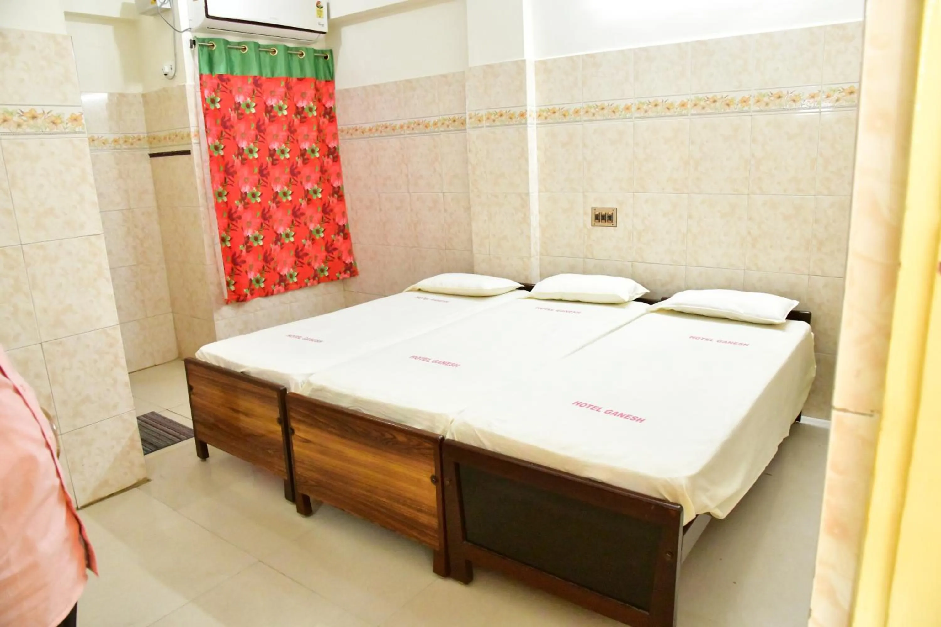 Bed in Hotel Ganesh Lodge