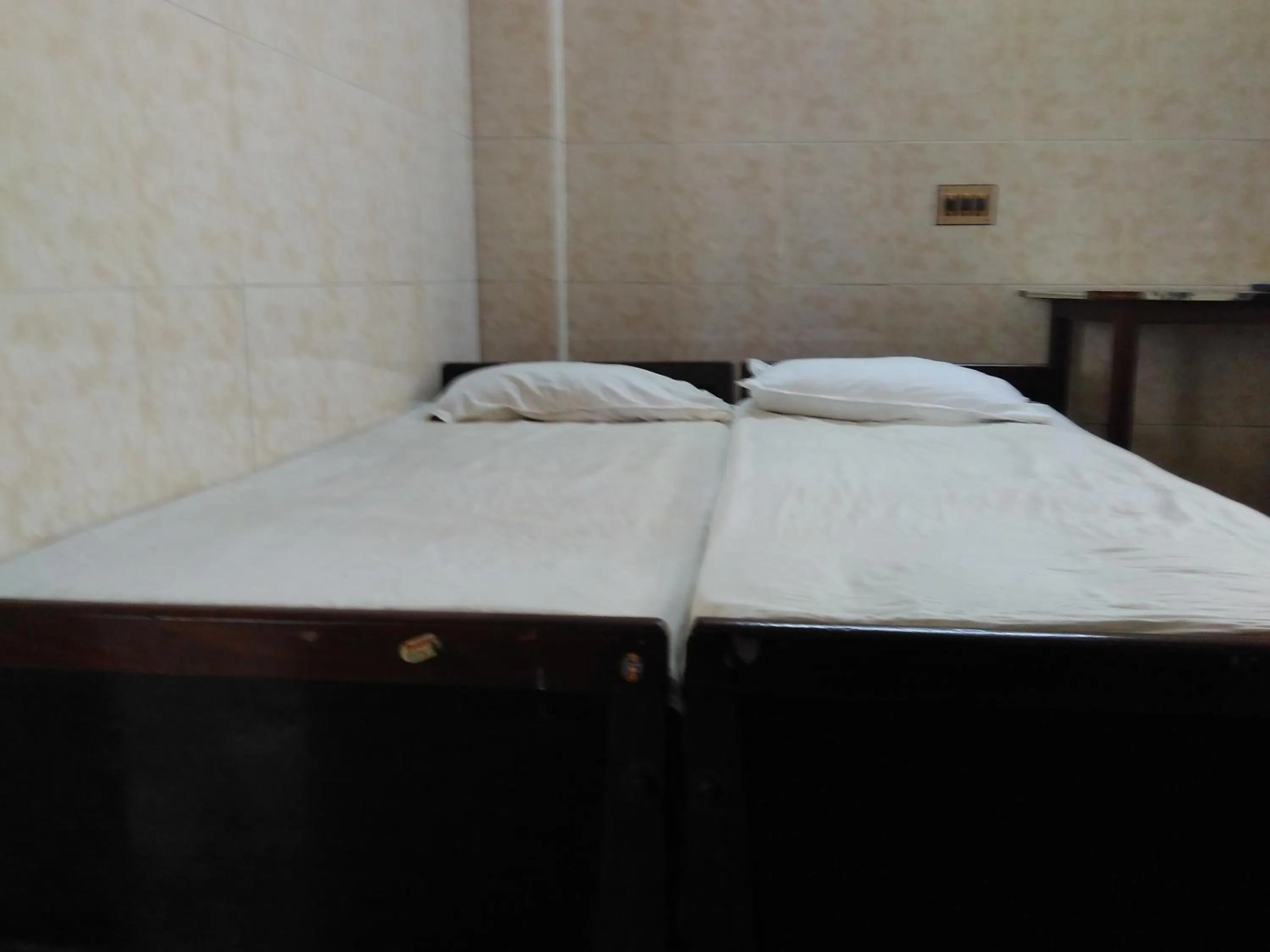 Bed in Hotel Ganesh Lodge