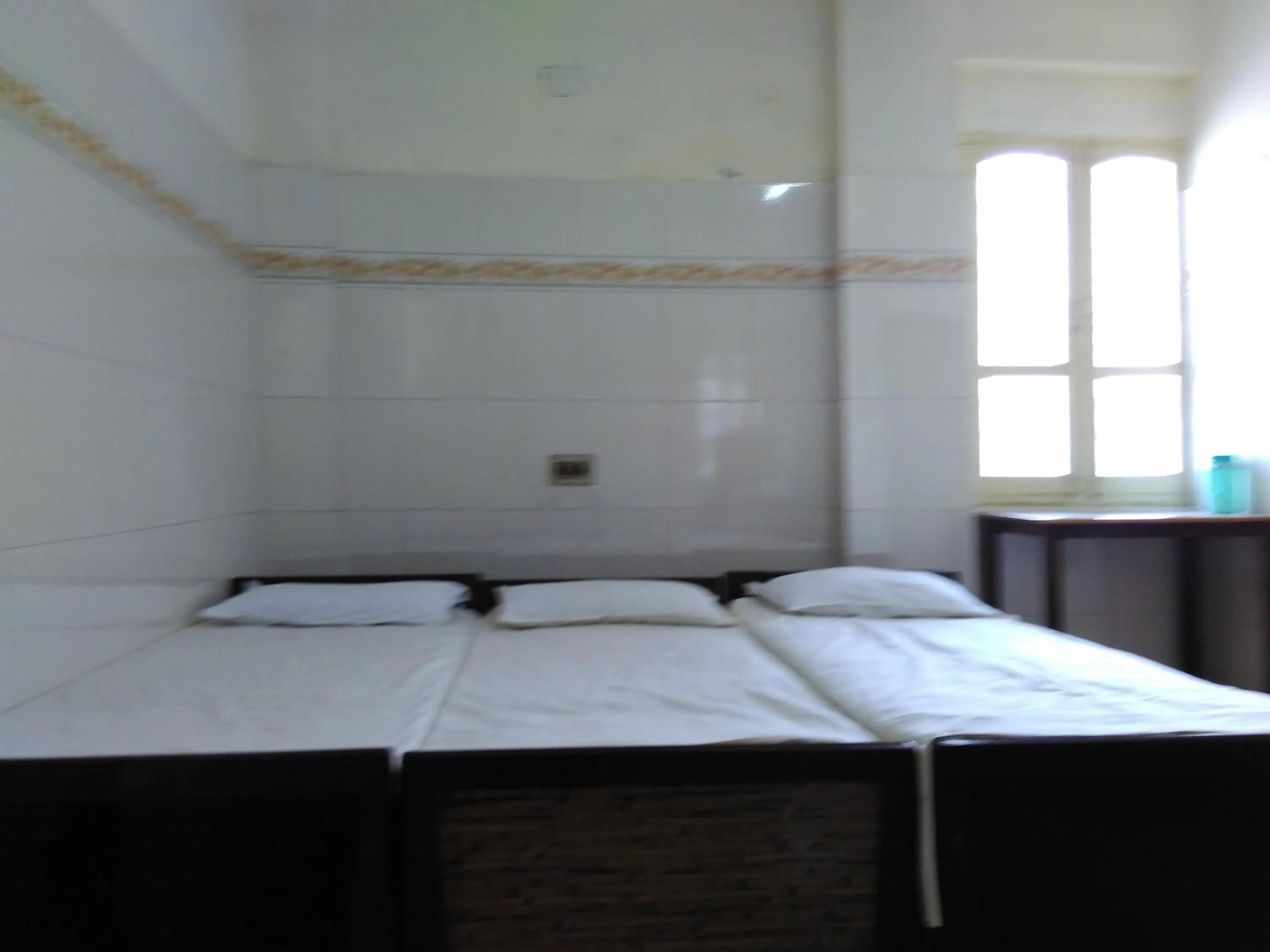 Bed in Hotel Ganesh Lodge