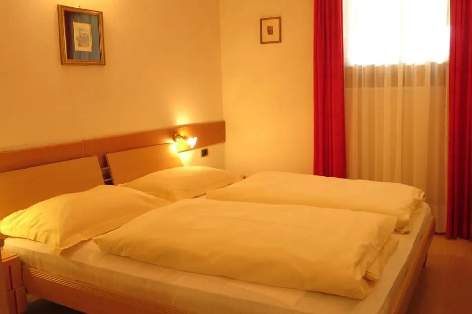 Bed in Apartments Residence Montana