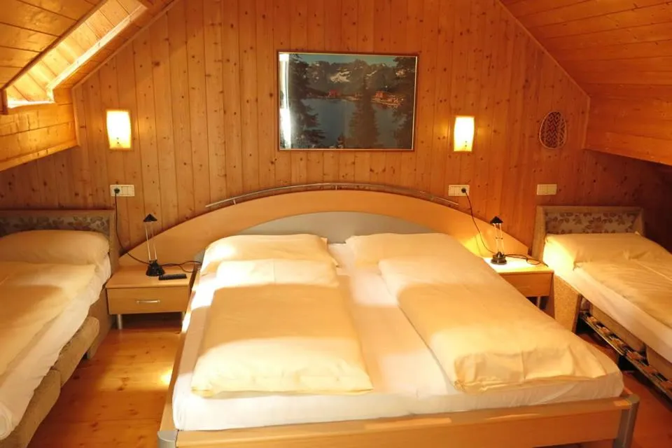 Bed in Apartments Residence Montana