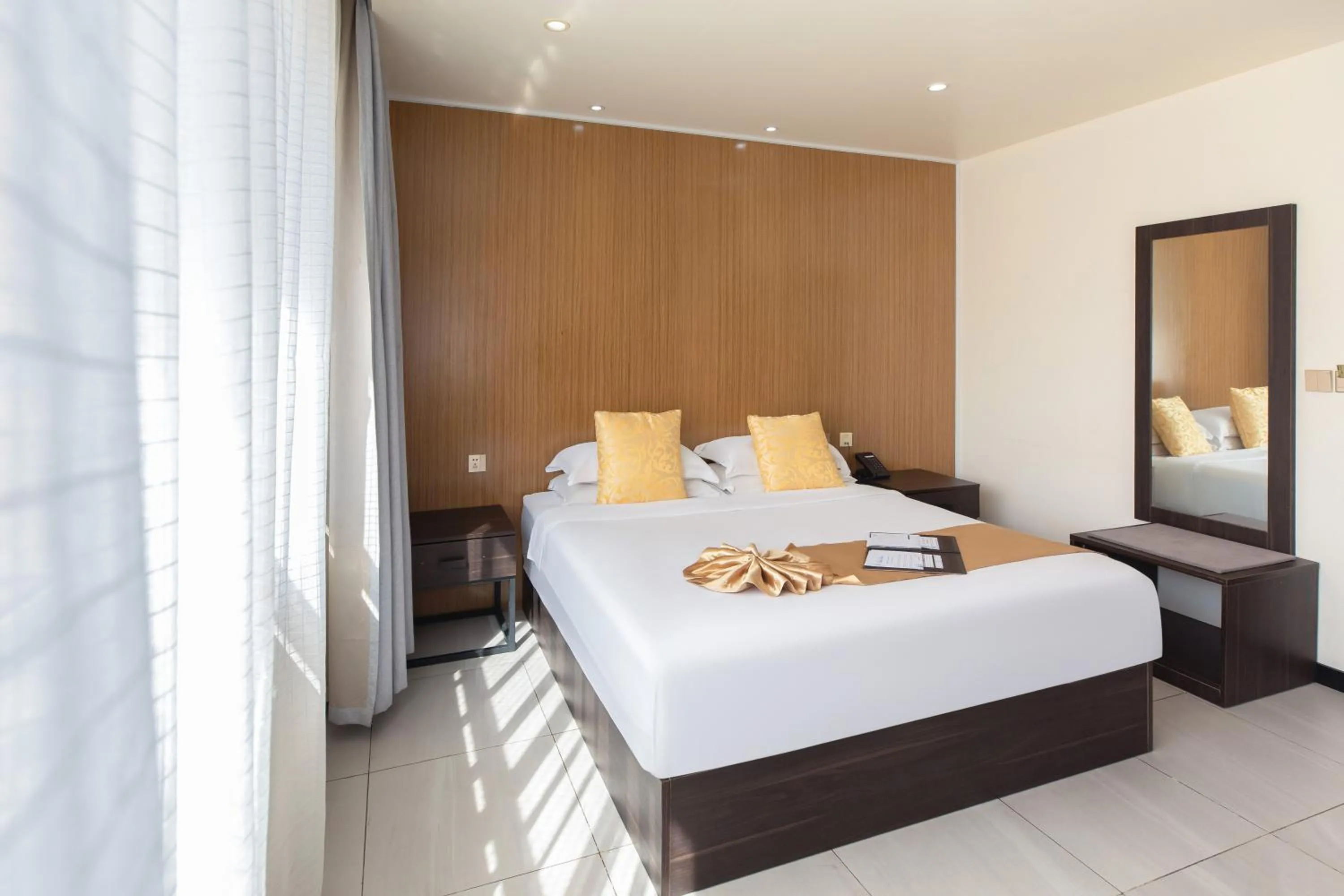 Bed in Tauese Seaview Hotel