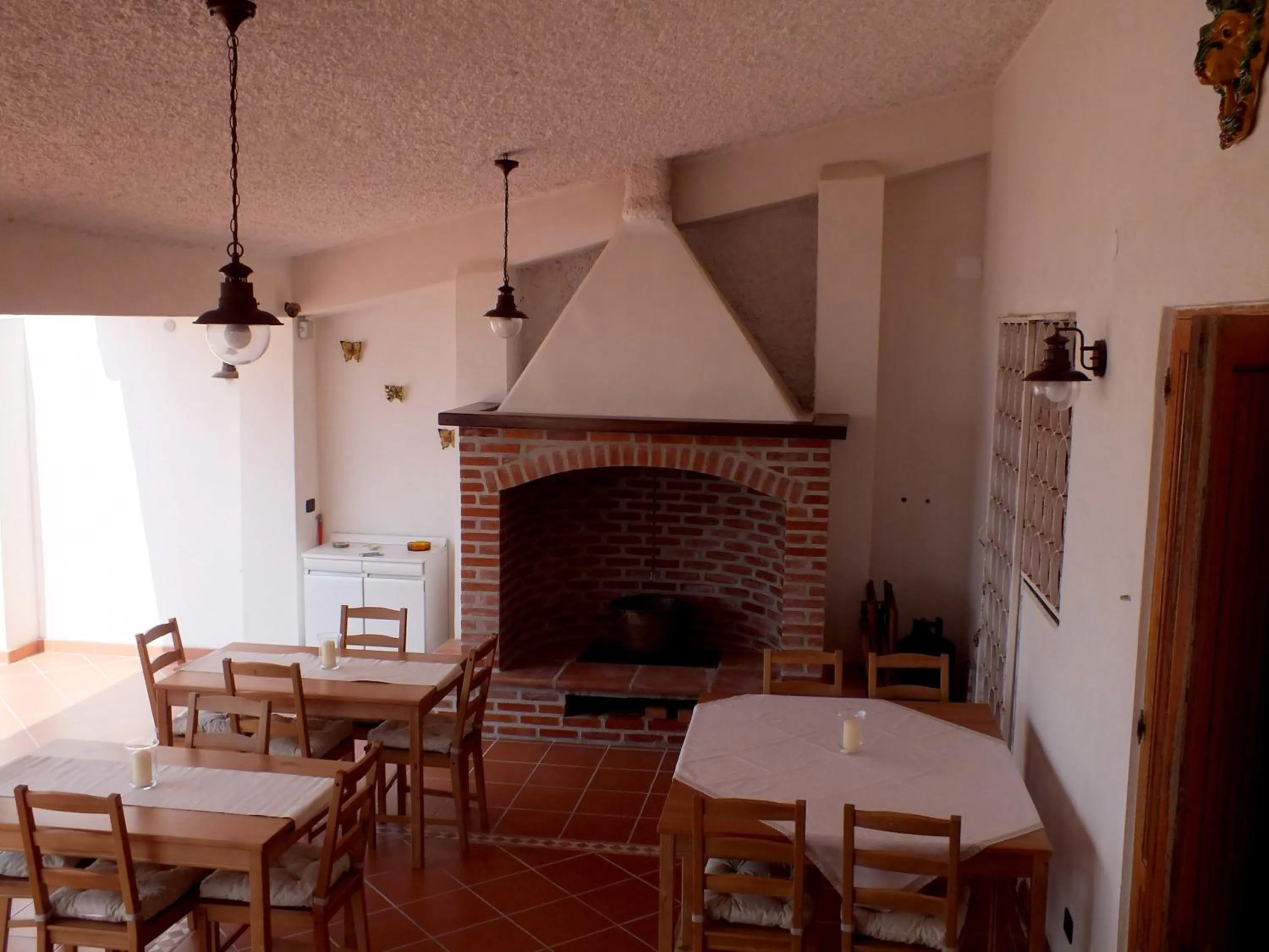 Communal lounge/ TV room in B&B Villa sul Mare