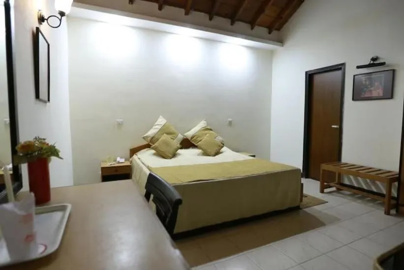 Bed in Woodsvilla Resort Ranikhet