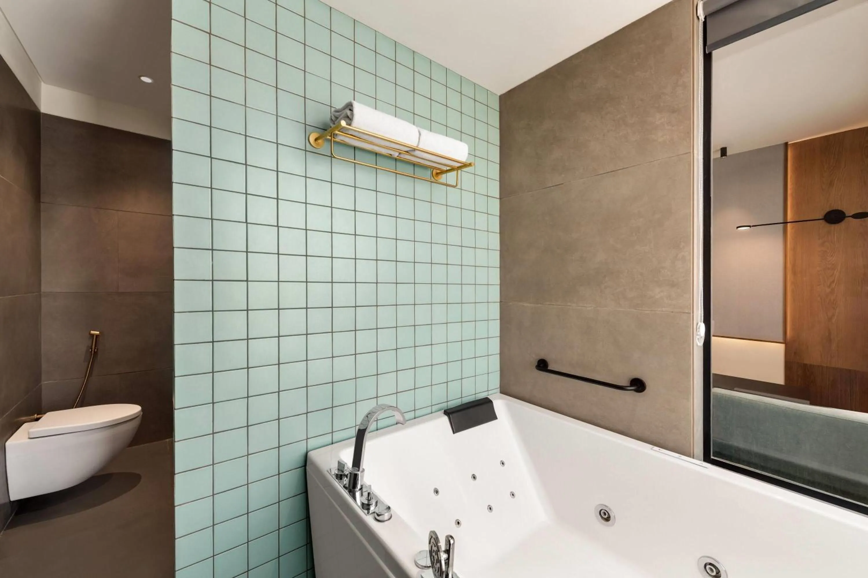 Bathroom in Ramada Encore by Wyndham Ambala GT Road