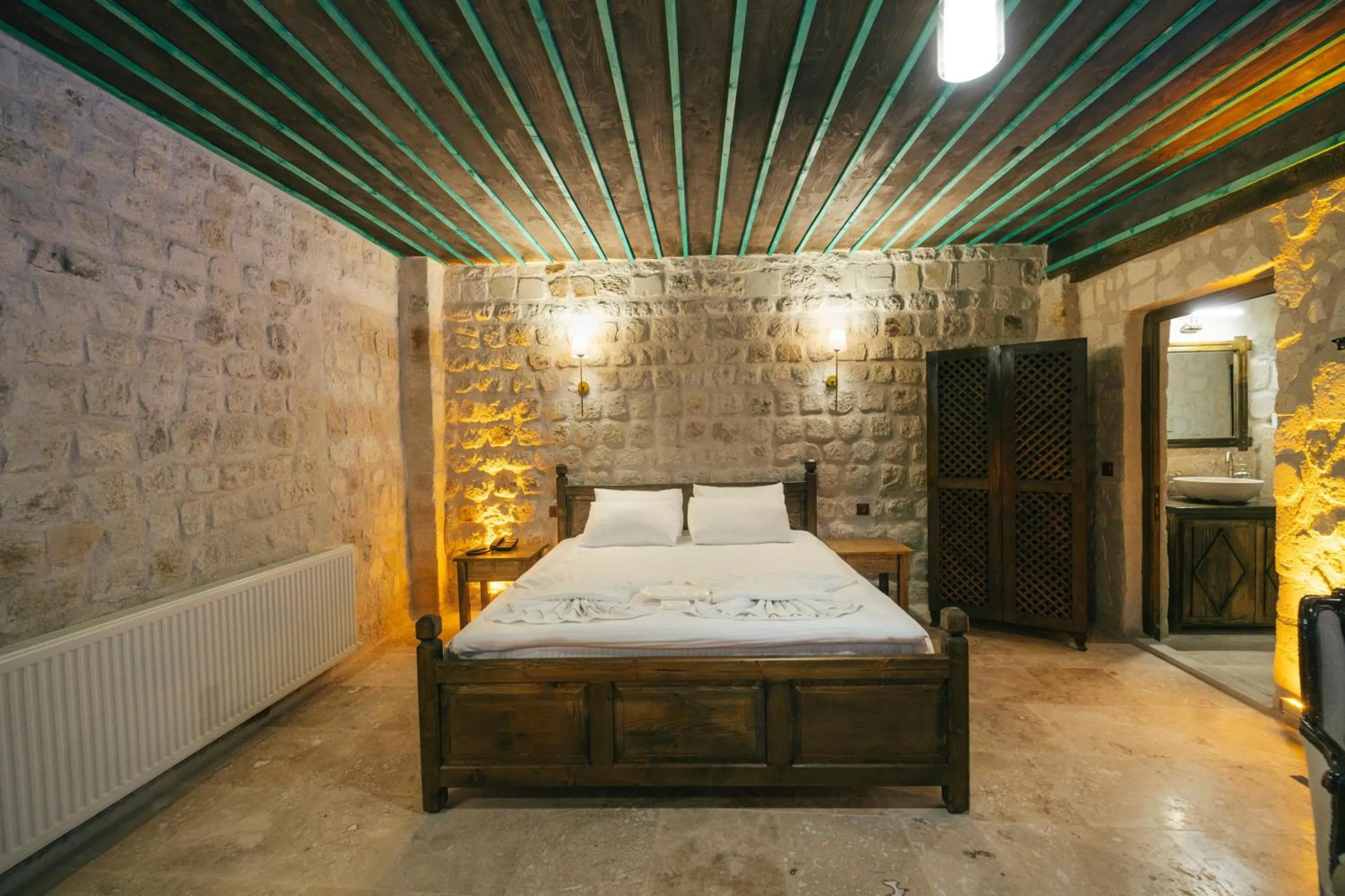 Bed in Cappatria Cave House