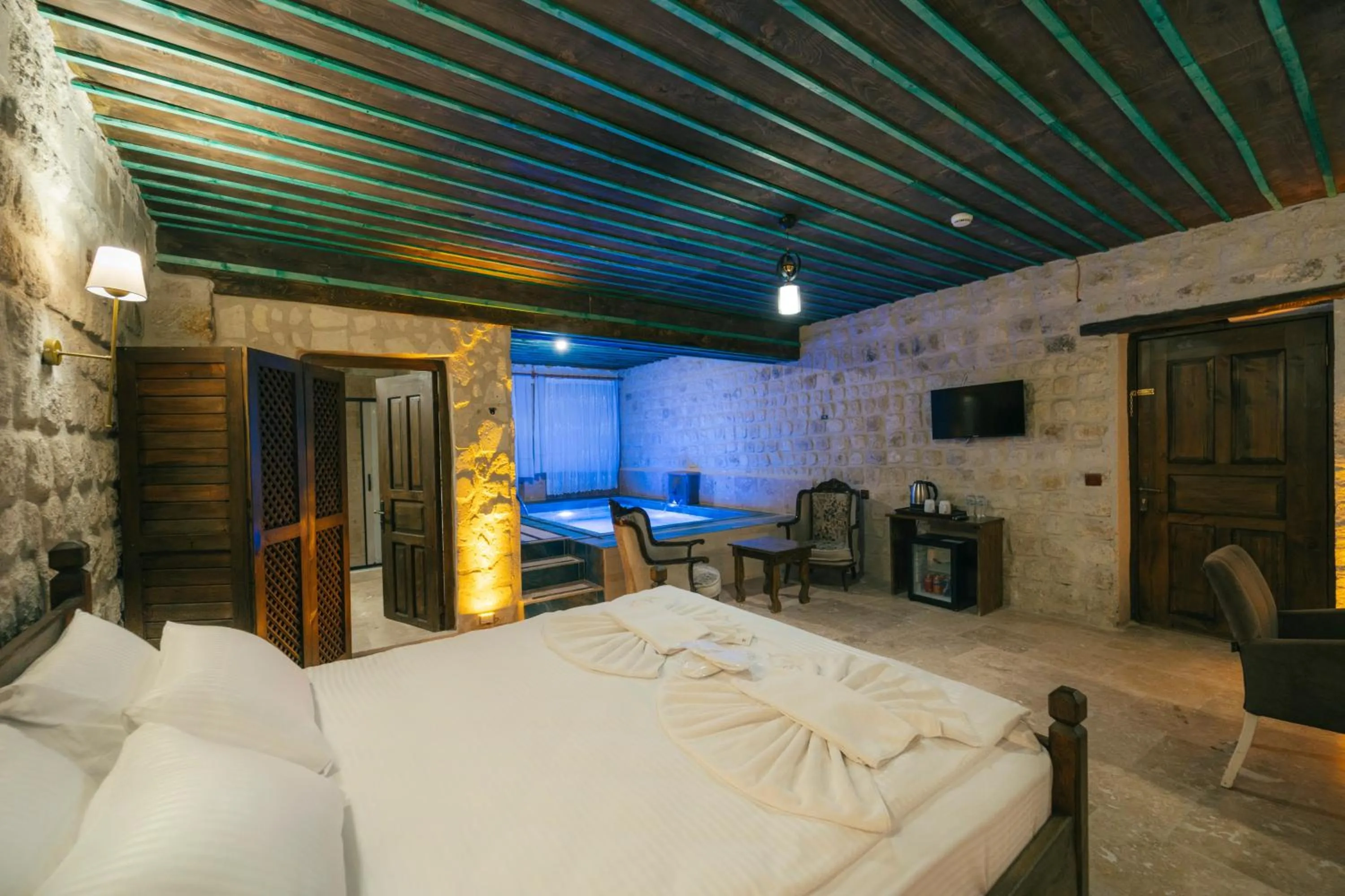 Bed in Cappatria Cave House