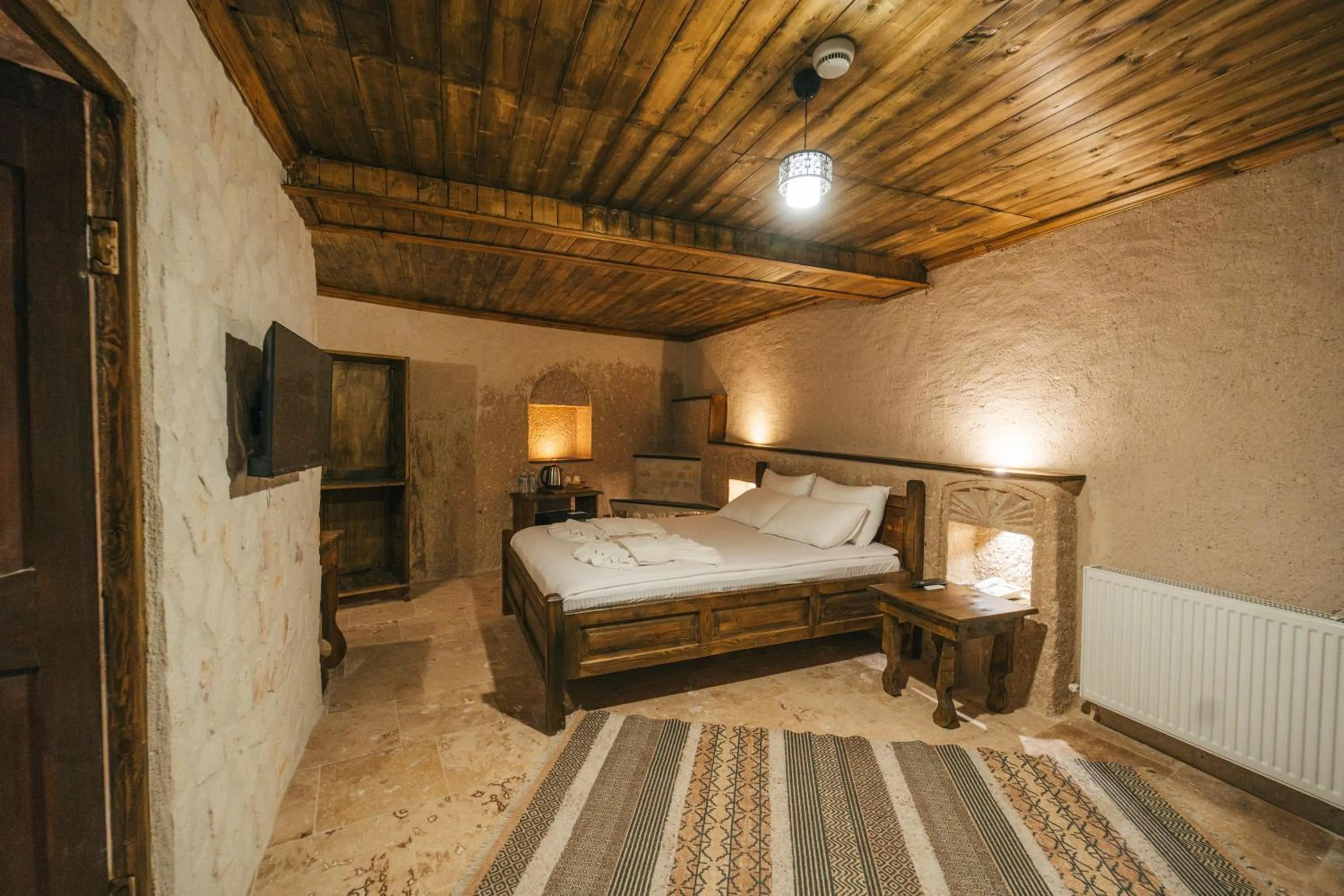 Bed in Cappatria Cave House