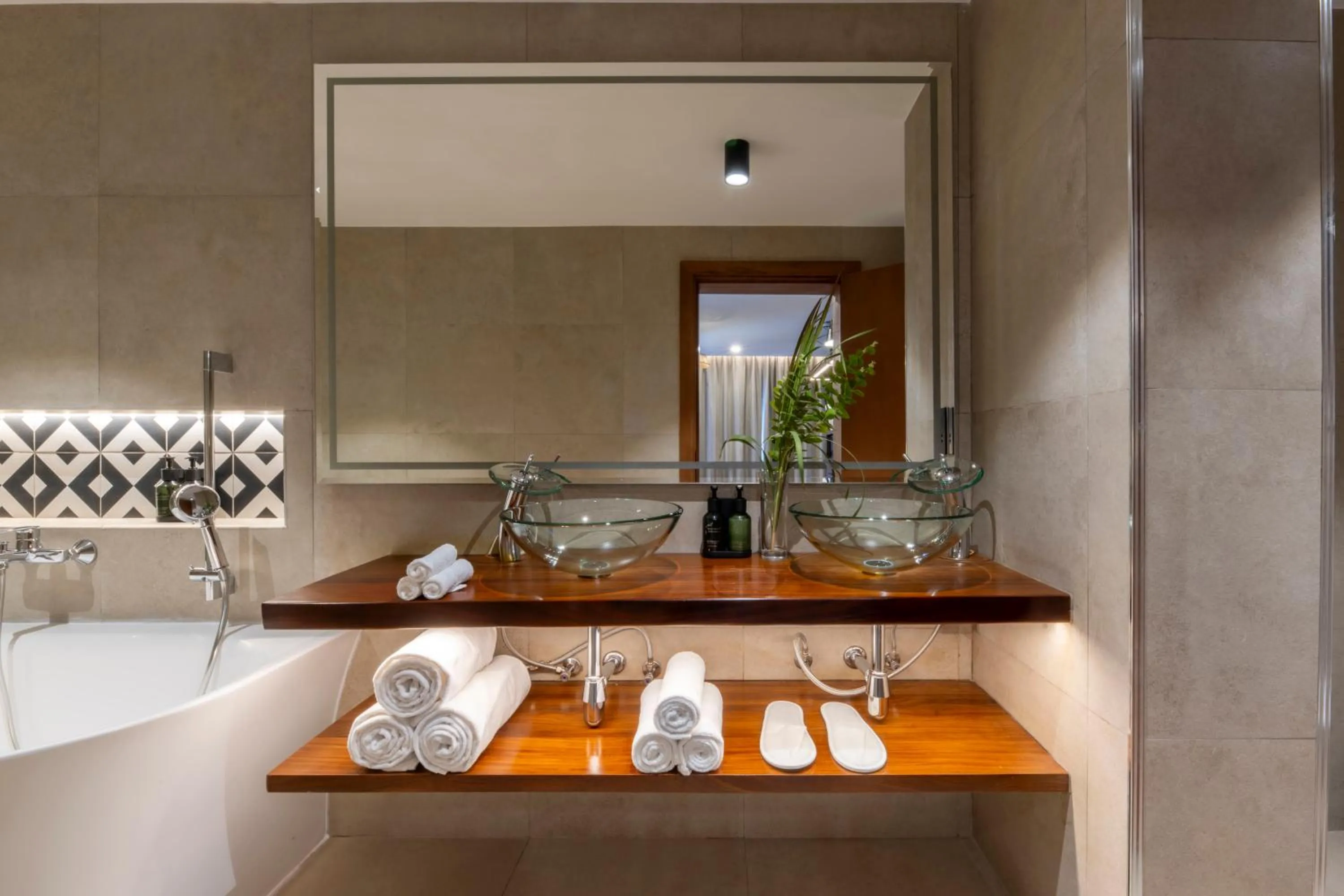 Bathroom in Zaria Court Kigali, Tapestry Collection by Hilton