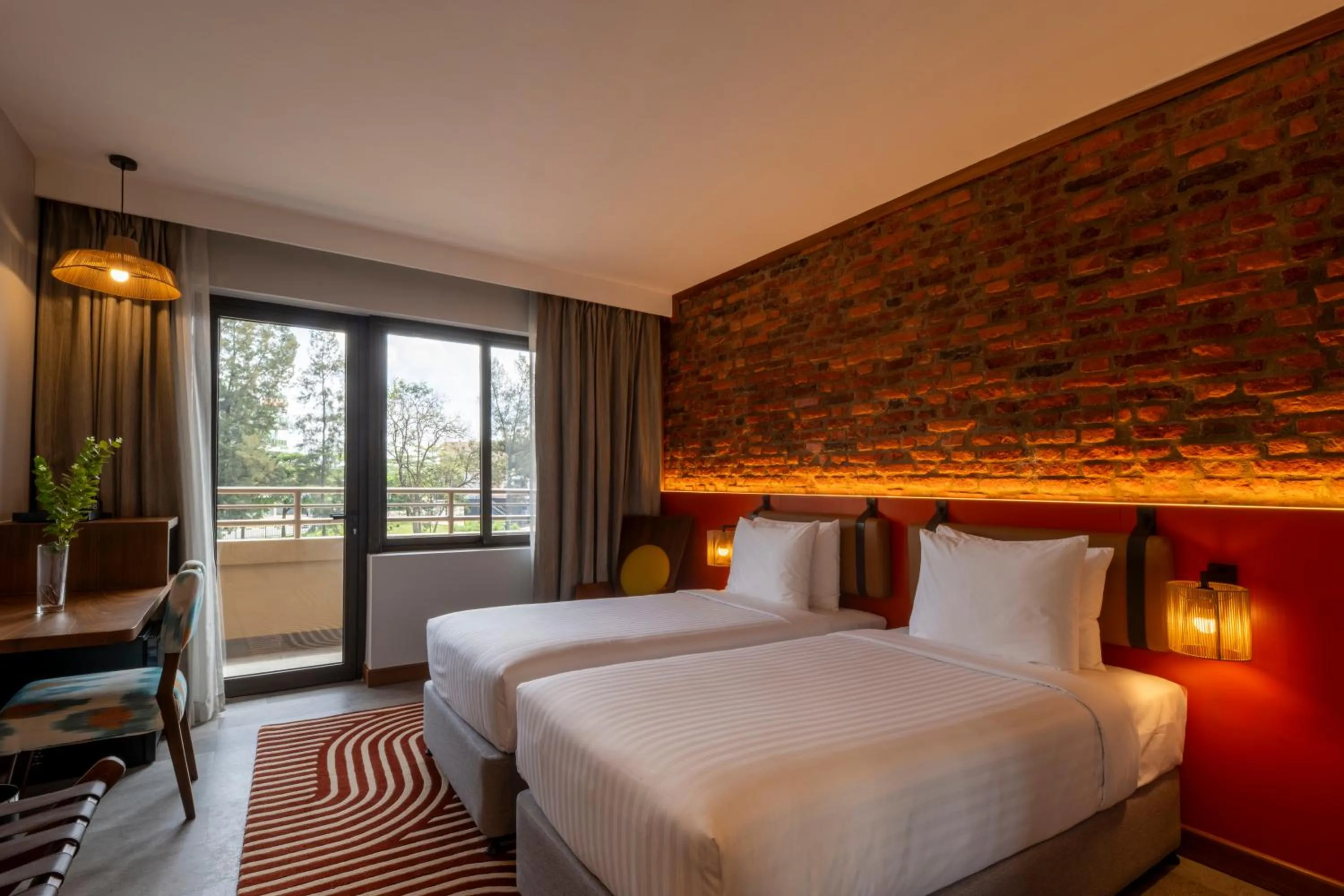 Bed in Zaria Court Kigali, Tapestry Collection by Hilton