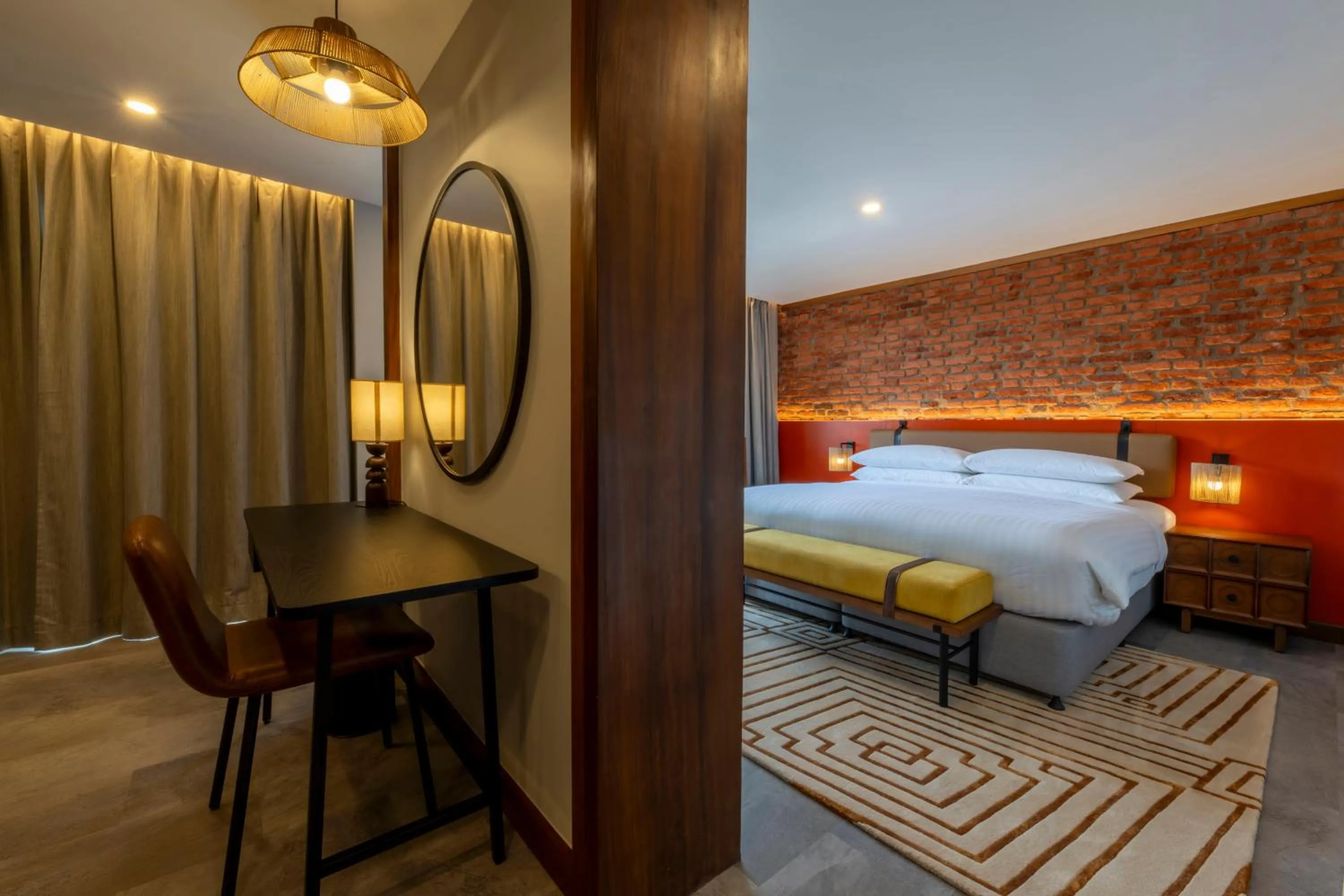 Living room, Bed in Zaria Court Kigali, Tapestry Collection by Hilton