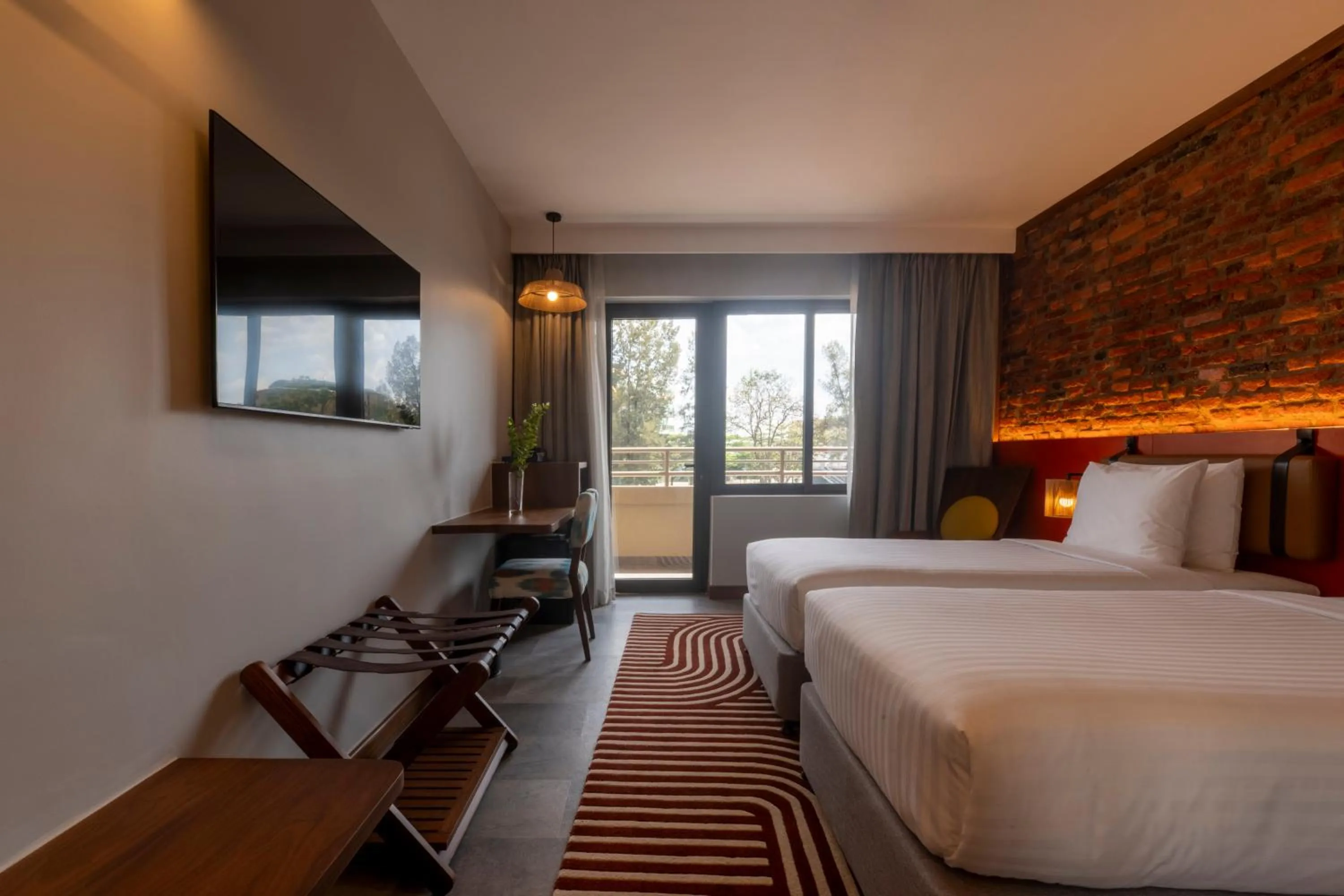 Bed in Zaria Court Kigali, Tapestry Collection by Hilton