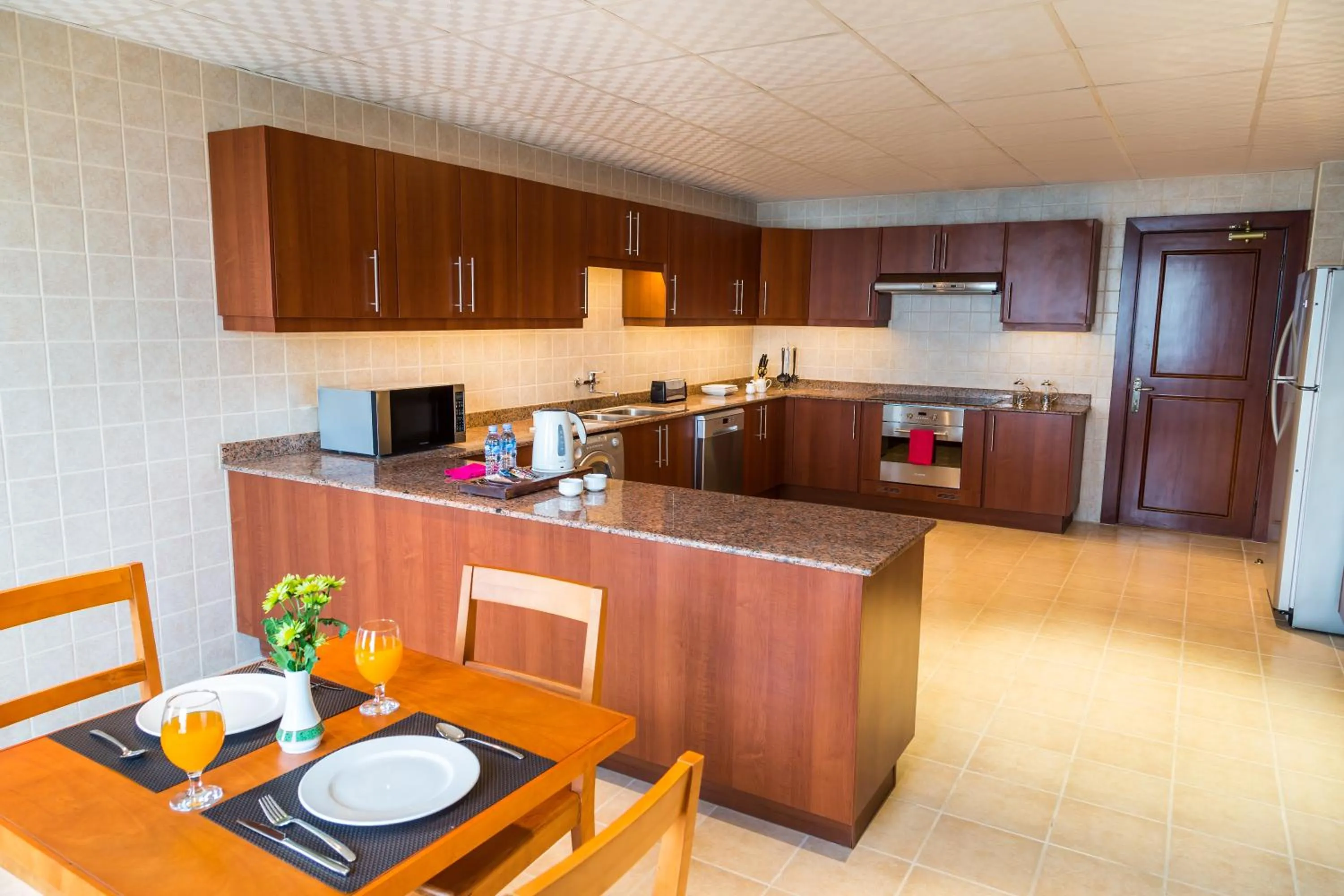 Kitchen or kitchenette in Sedra Arjaan by Rotana