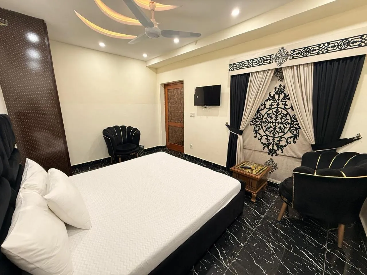 Bed in Serene Elegance Hotel