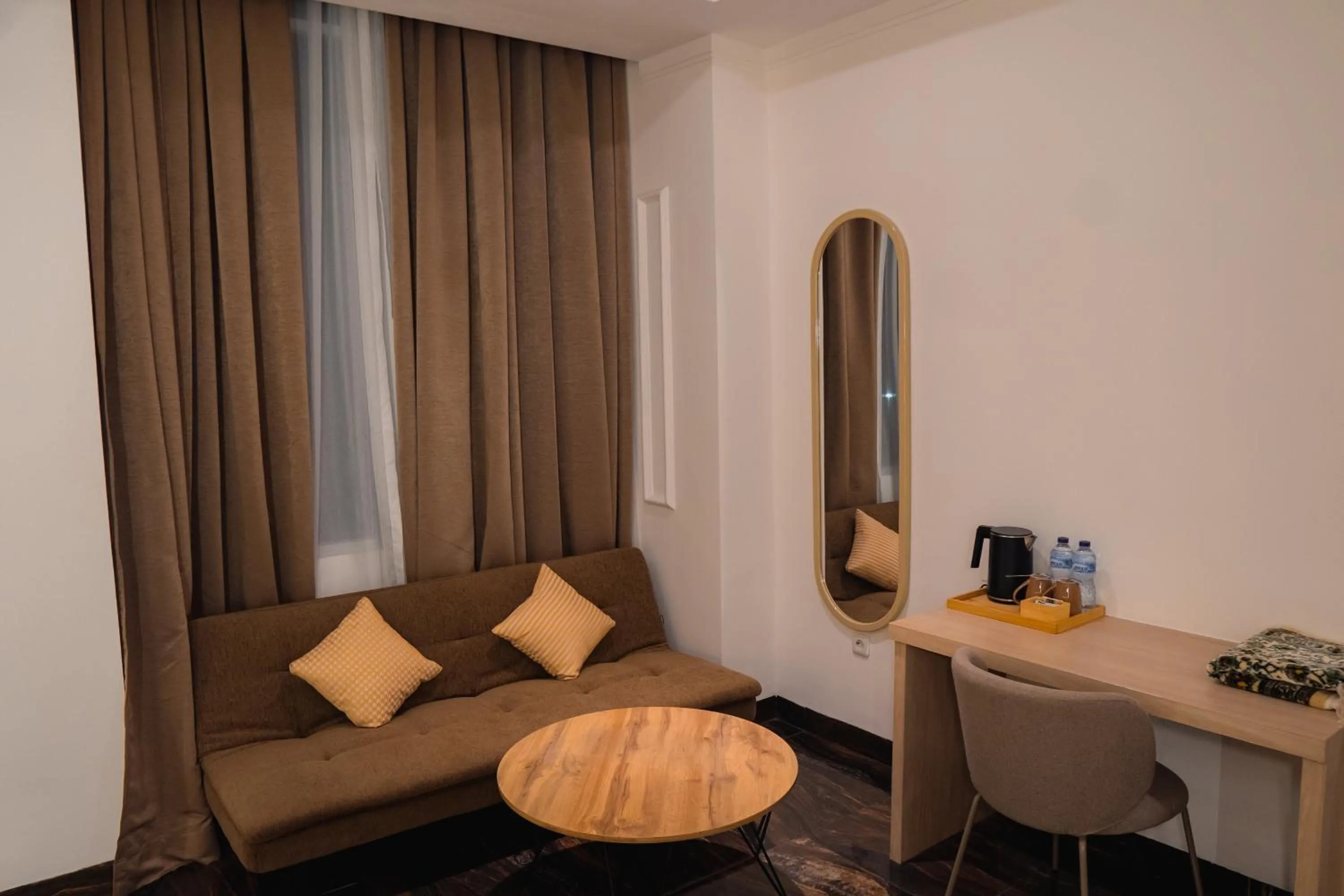 Seating area in Fahira Hotel Syariah Padang