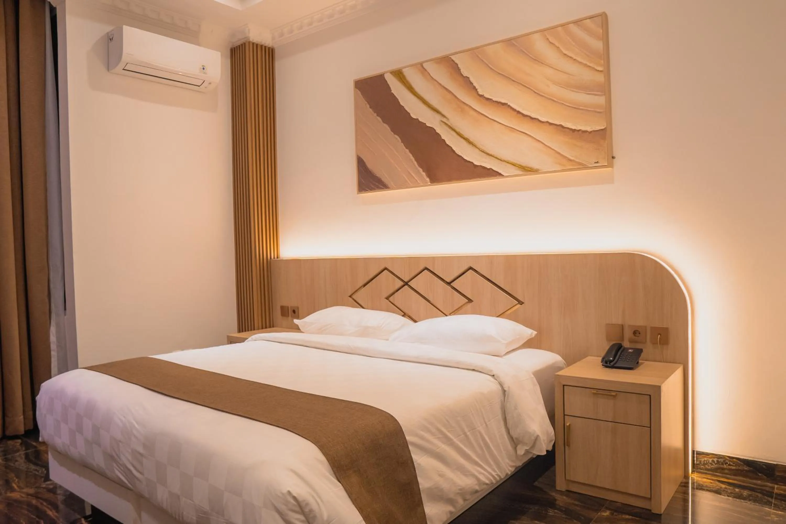 Bed in Fahira Hotel Syariah Padang