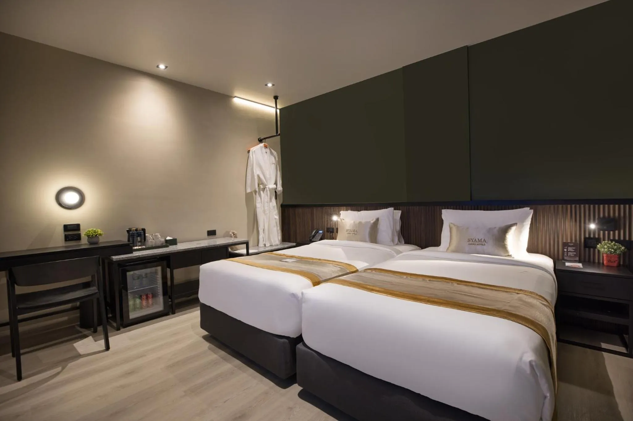 Bed in Syama Mansion Patong, an Aspira Collection