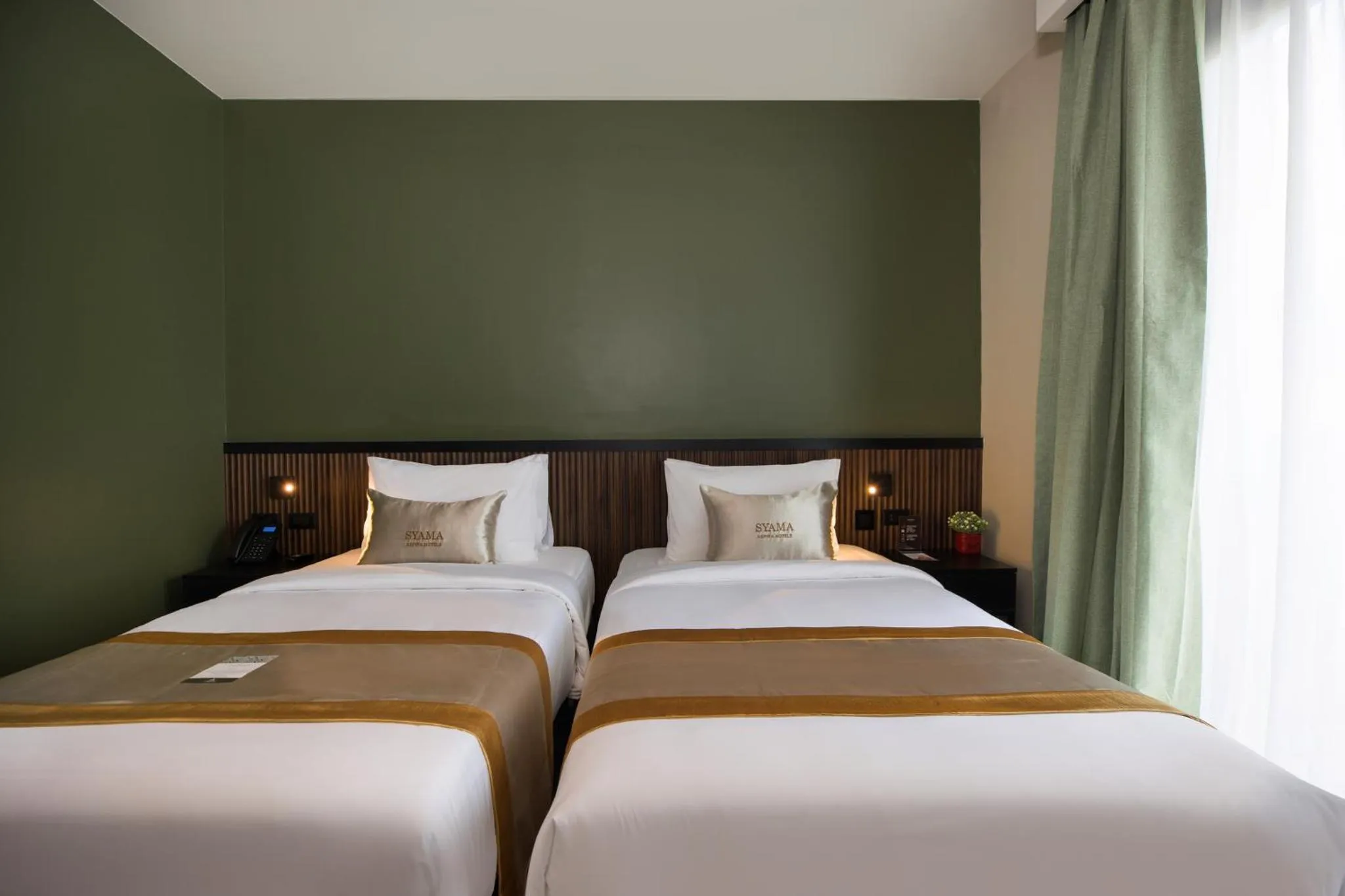 Bed in Syama Mansion Patong, an Aspira Collection