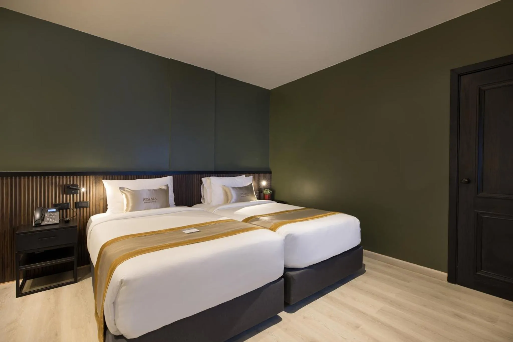 Bed in Syama Mansion Patong, an Aspira Collection