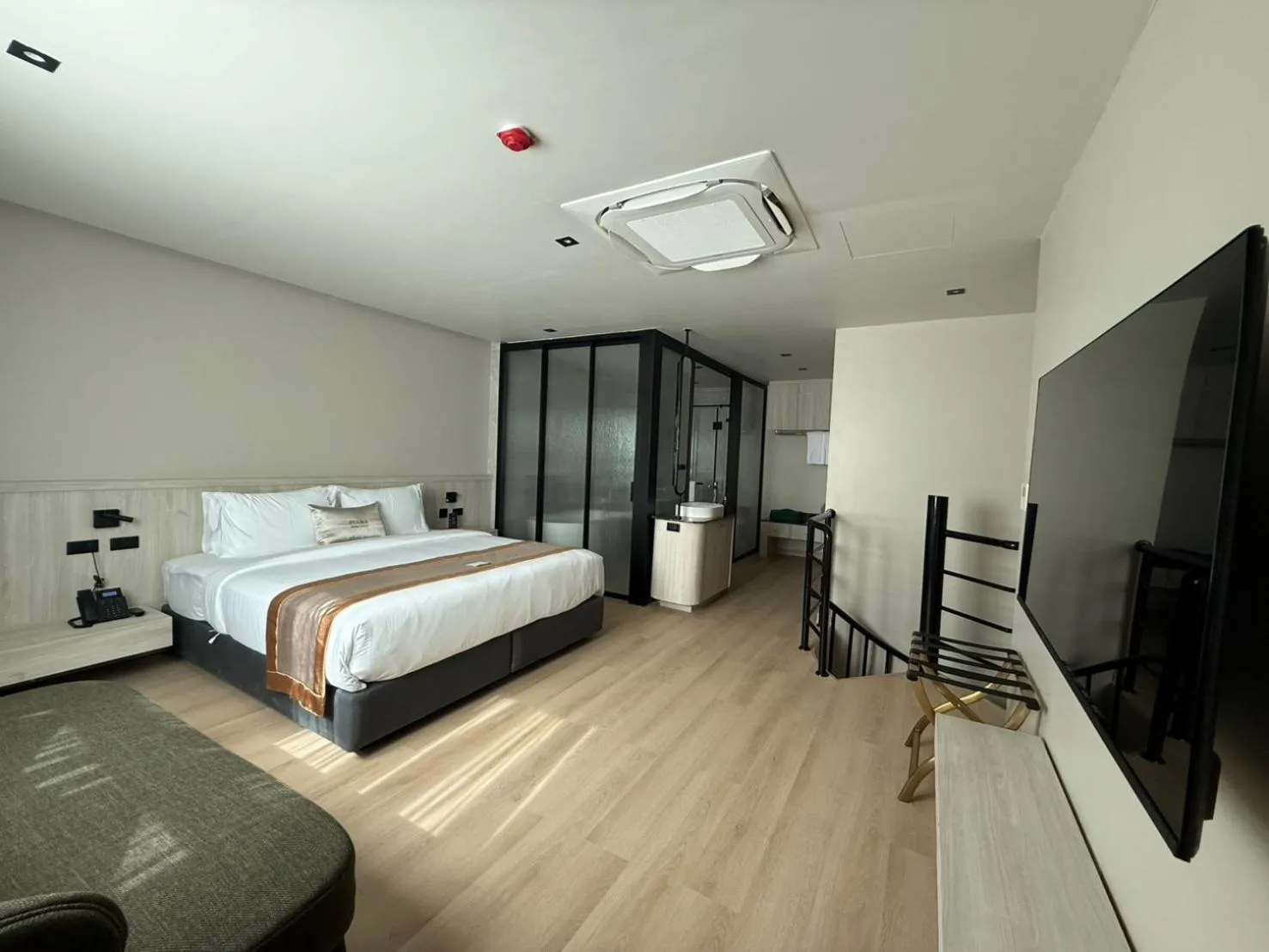 Bed in Syama Mansion Patong, an Aspira Collection