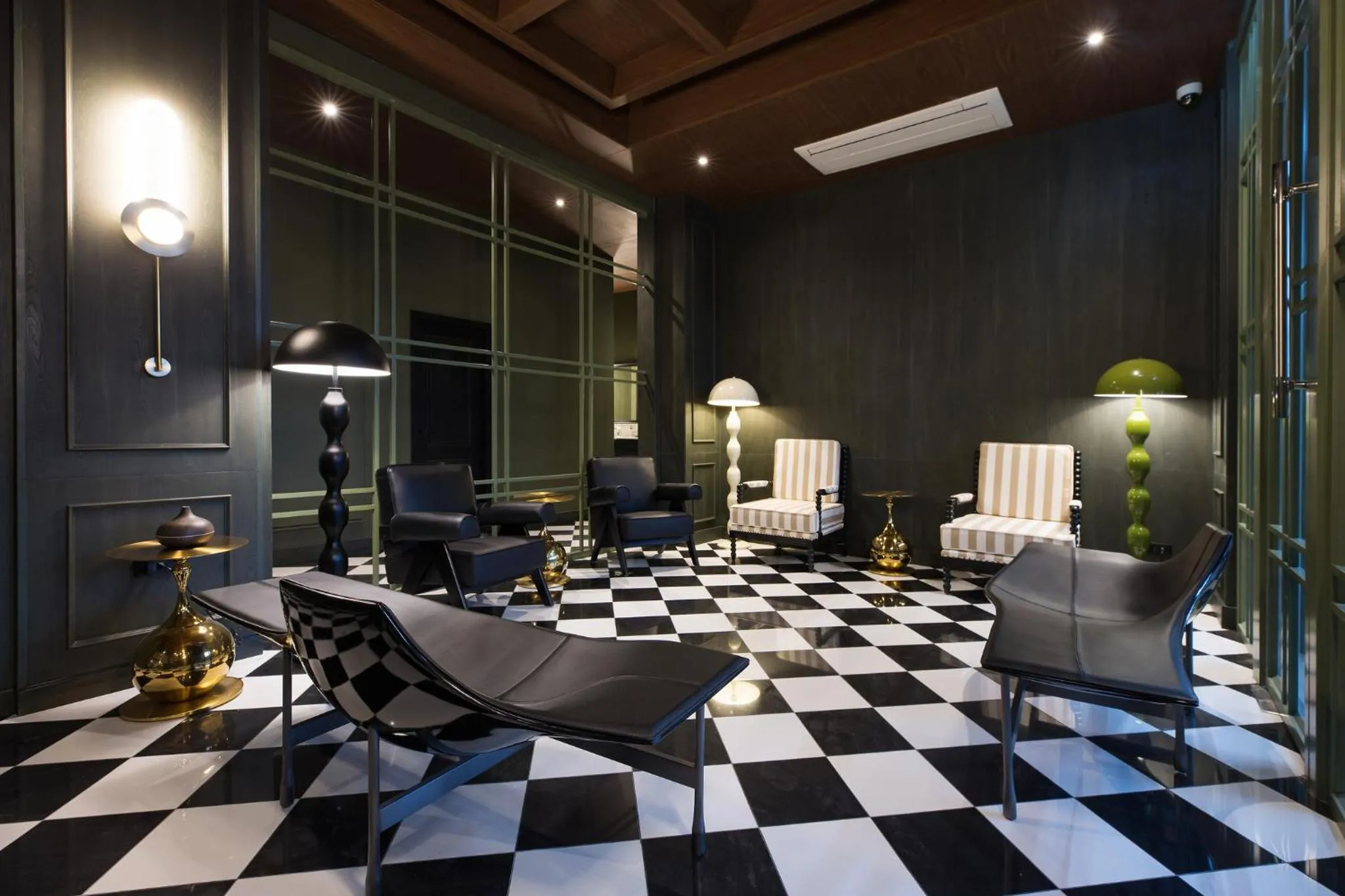 Living room in Syama Mansion Patong, an Aspira Collection