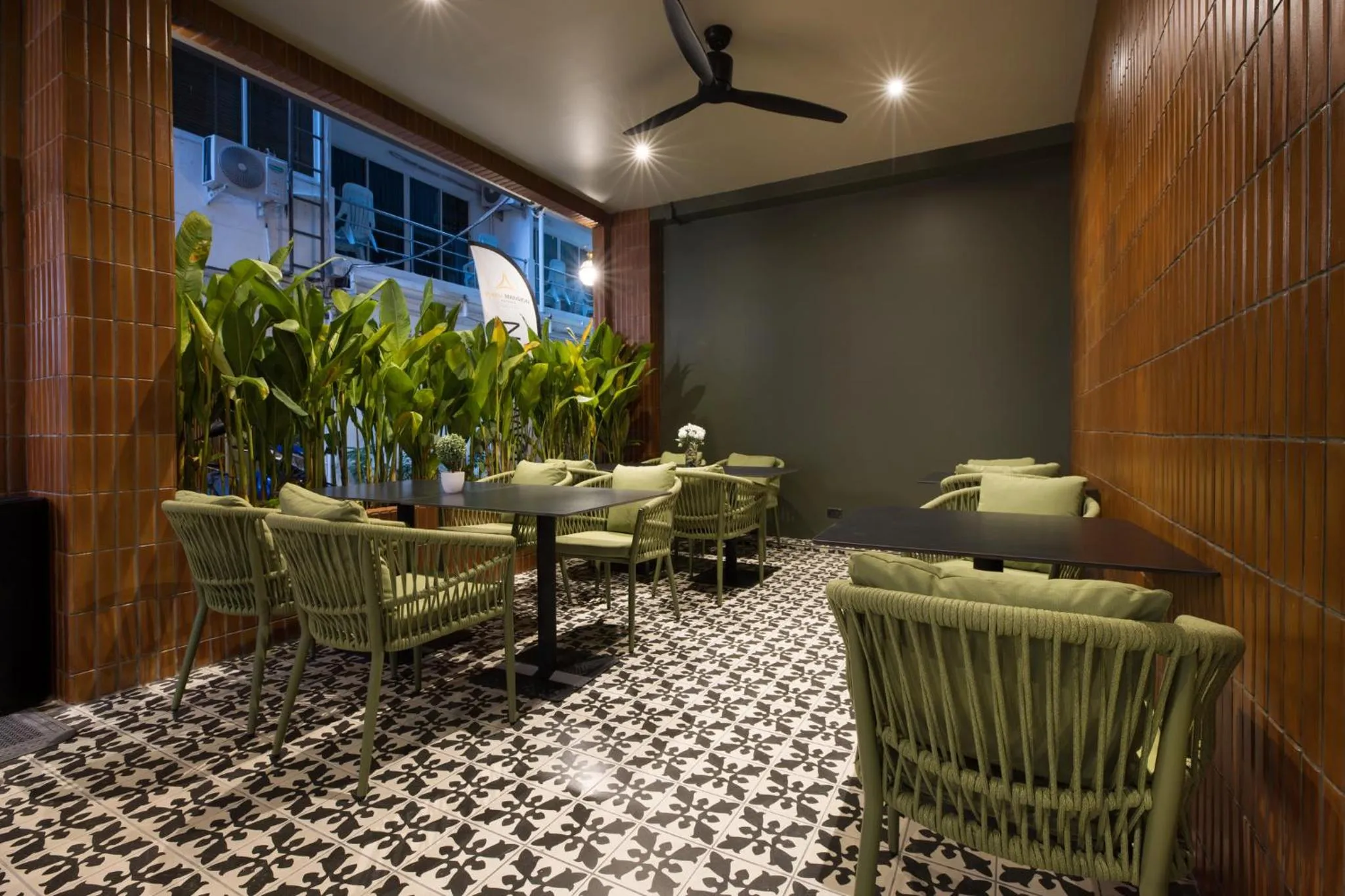 Living room in Syama Mansion Patong, an Aspira Collection