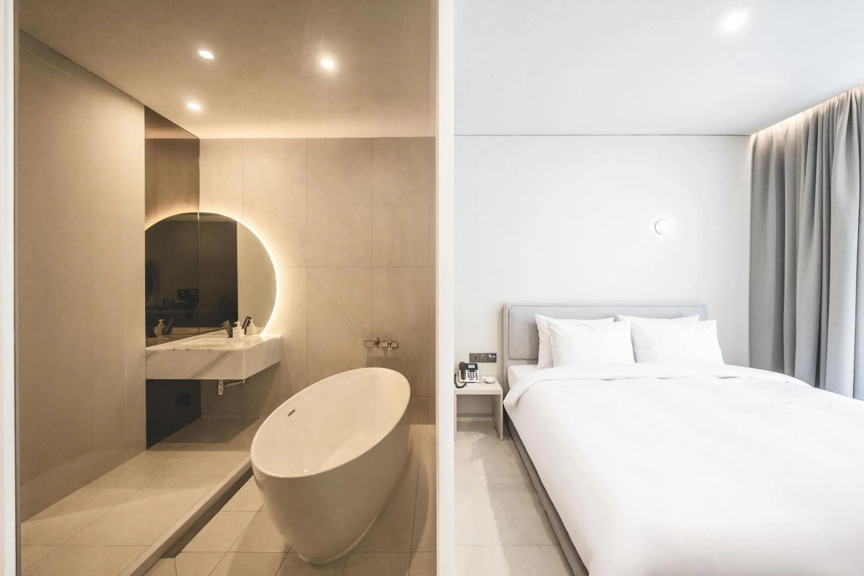 Bathroom, Bed in Gyeongju city hotel