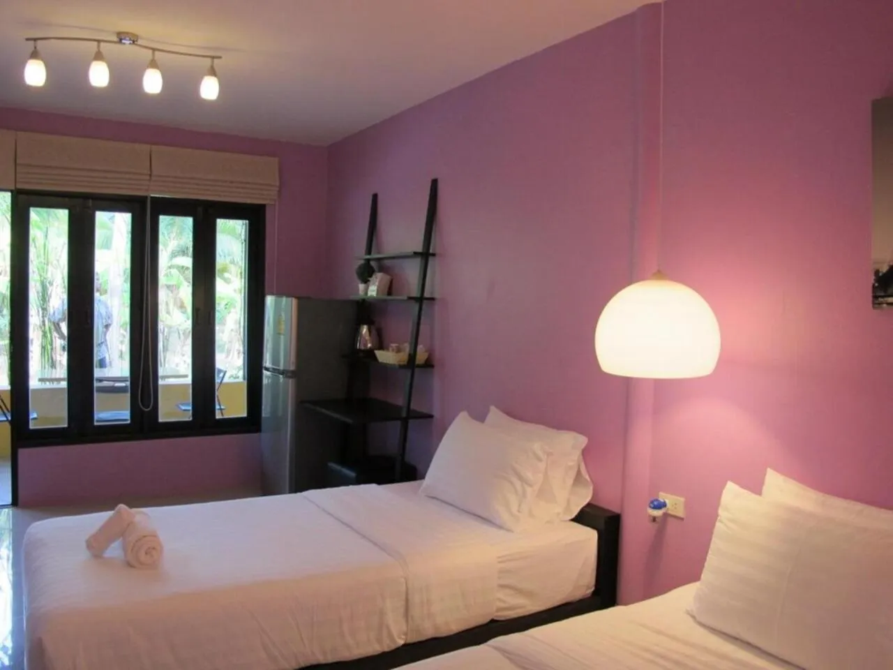 Bed in Panviman Amphawa Garden Resort