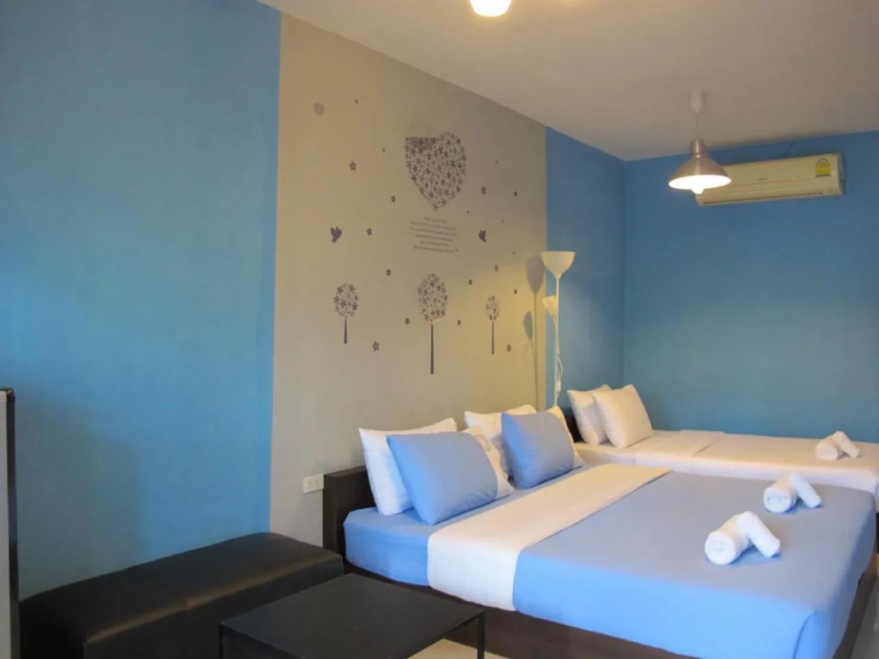 Bed in Panviman Amphawa Garden Resort