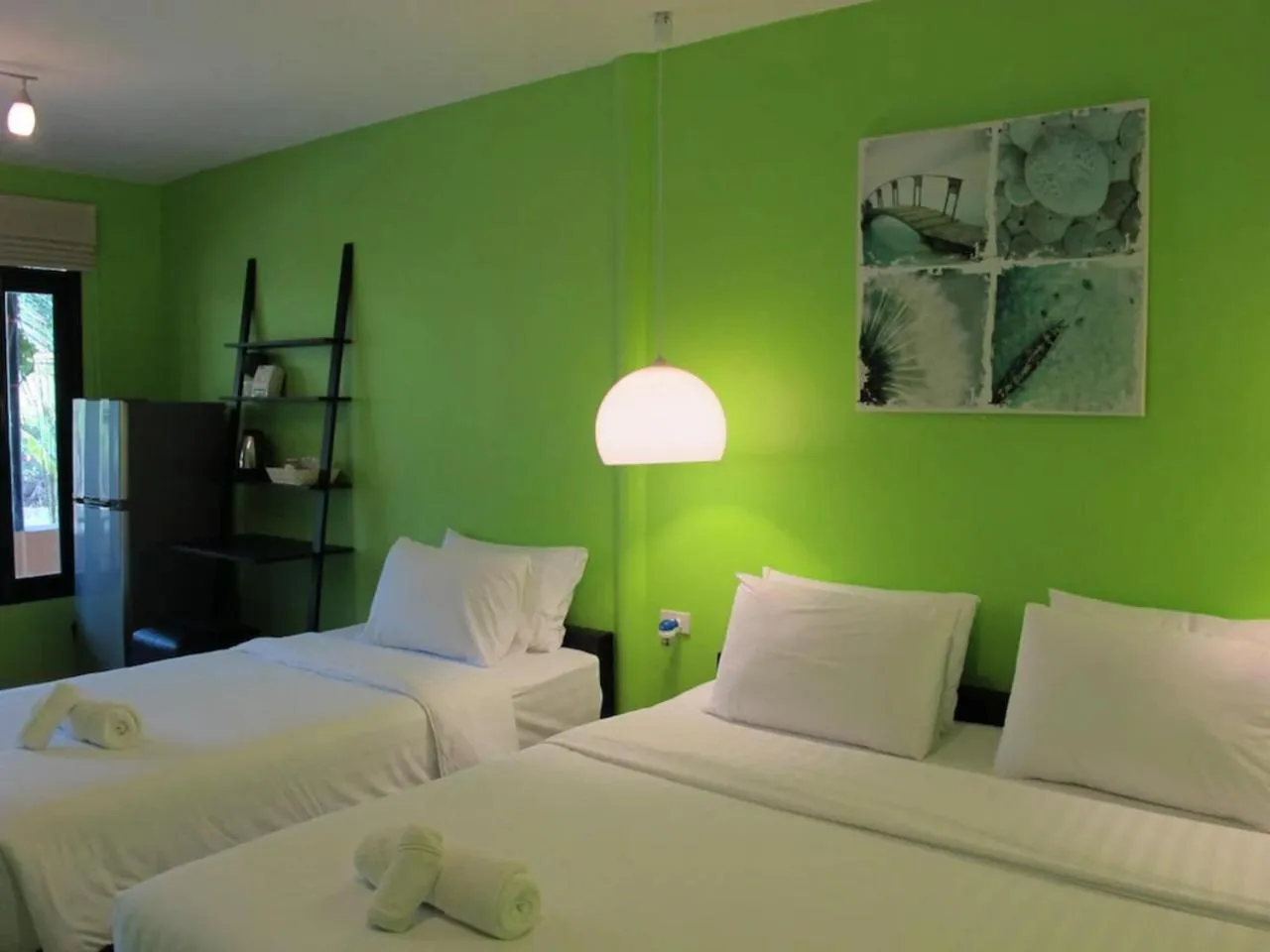 Bed in Panviman Amphawa Garden Resort