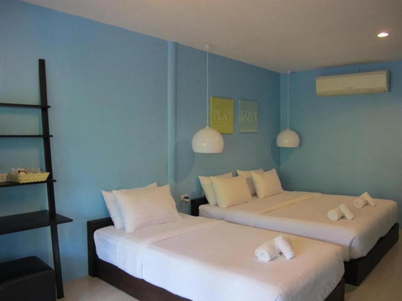 Bed in Panviman Amphawa Garden Resort