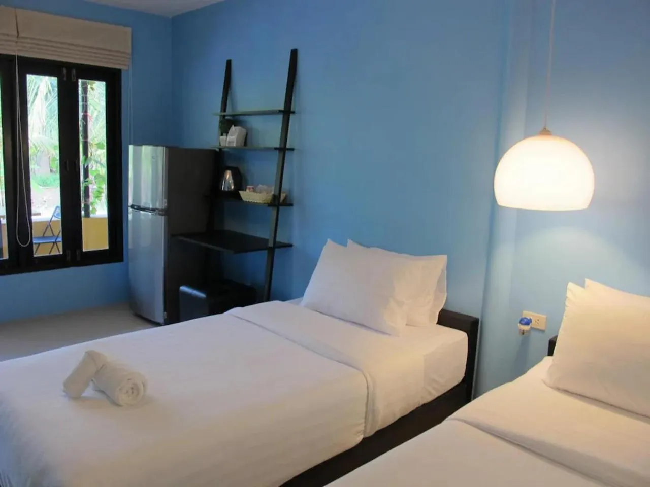 Bed in Panviman Amphawa Garden Resort