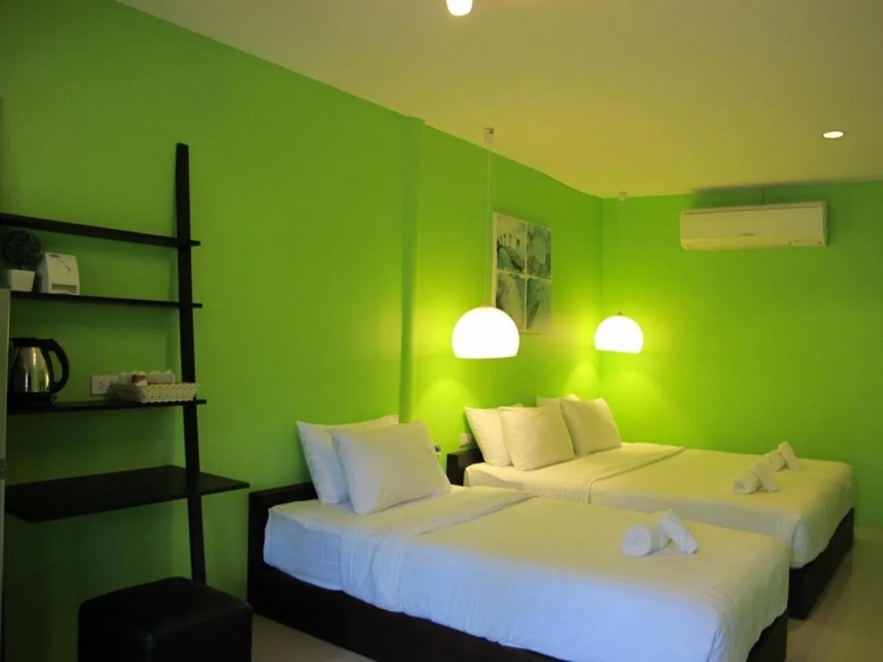 Bed in Panviman Amphawa Garden Resort