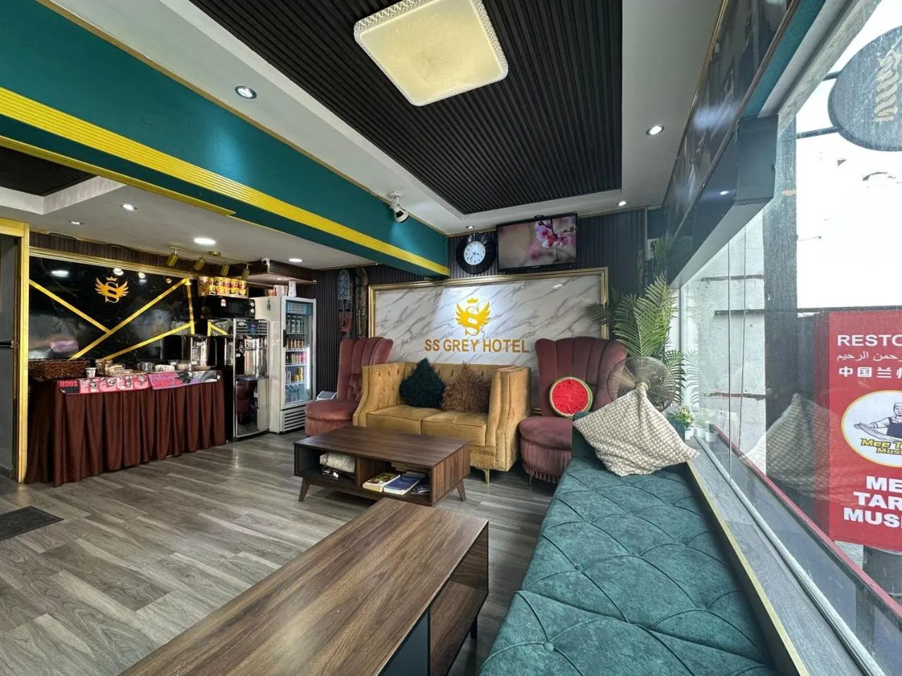 Property logo or sign in SS Grey Hotel