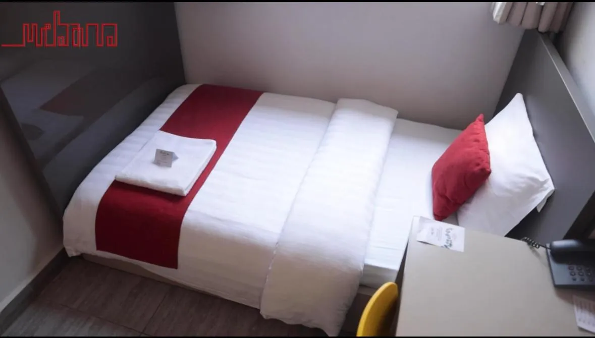 Bed in Urbano Hotel