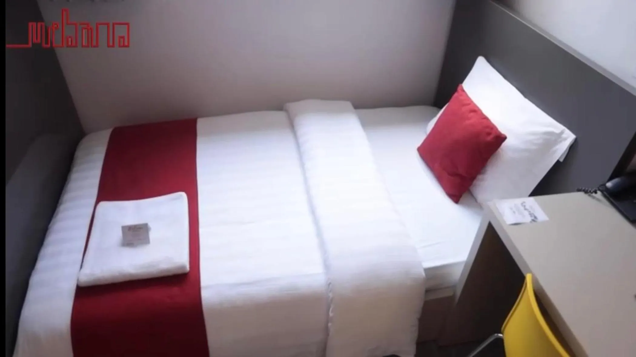 Bed in Urbano Hotel