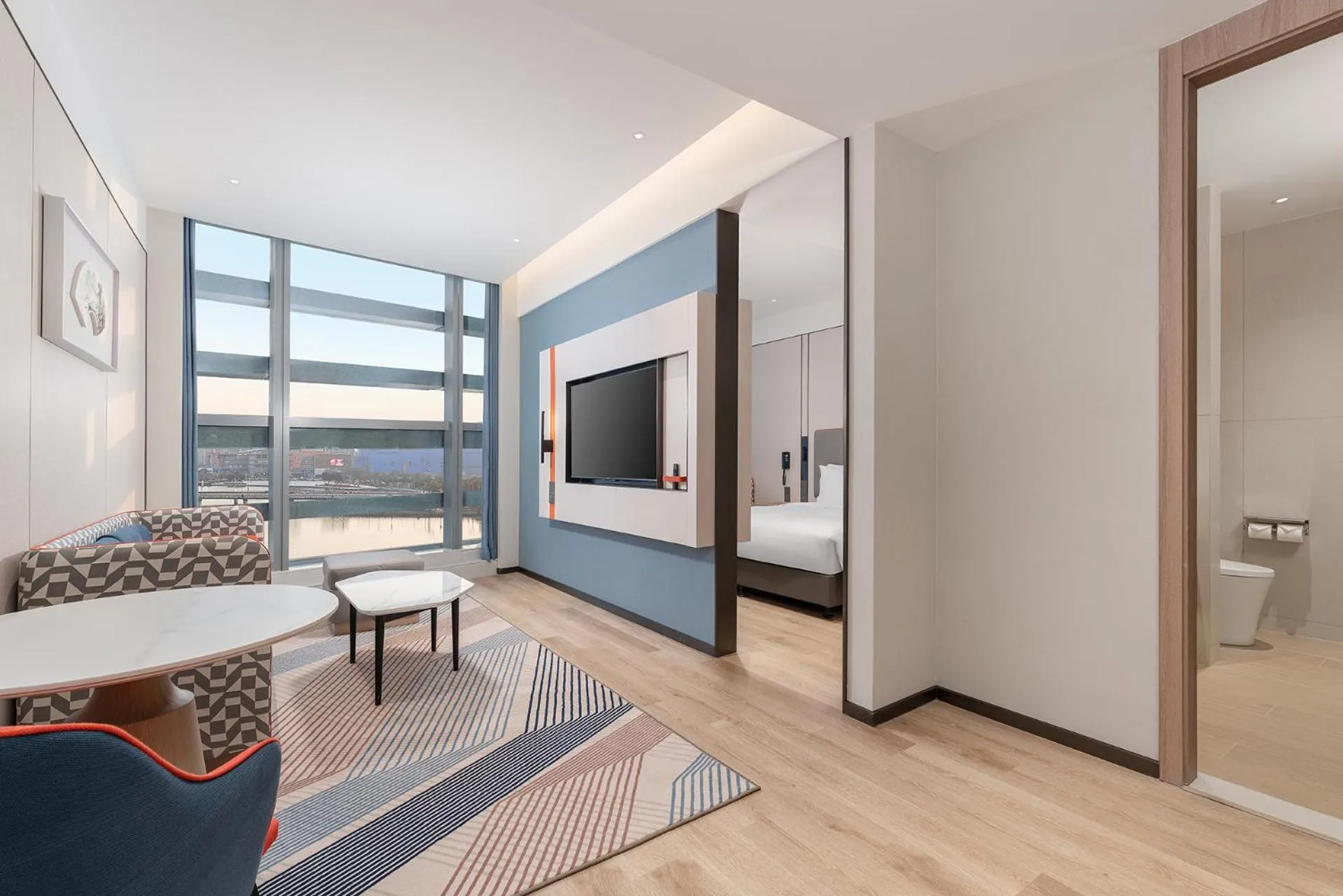 Living room, Bed in Holiday Inn Express Yangzhou Grand Canal Theatre