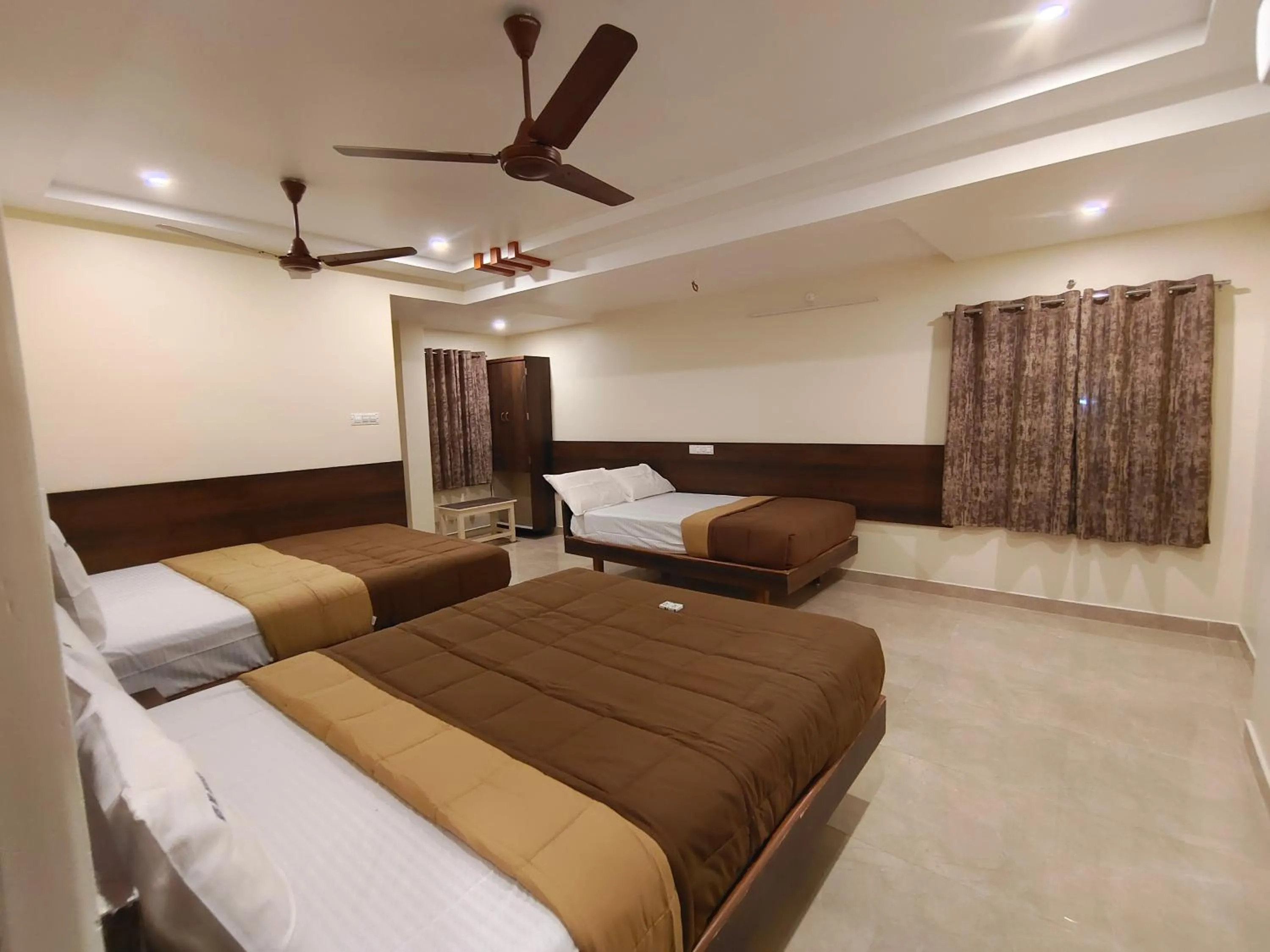 Bed in Hotel DKR Grand