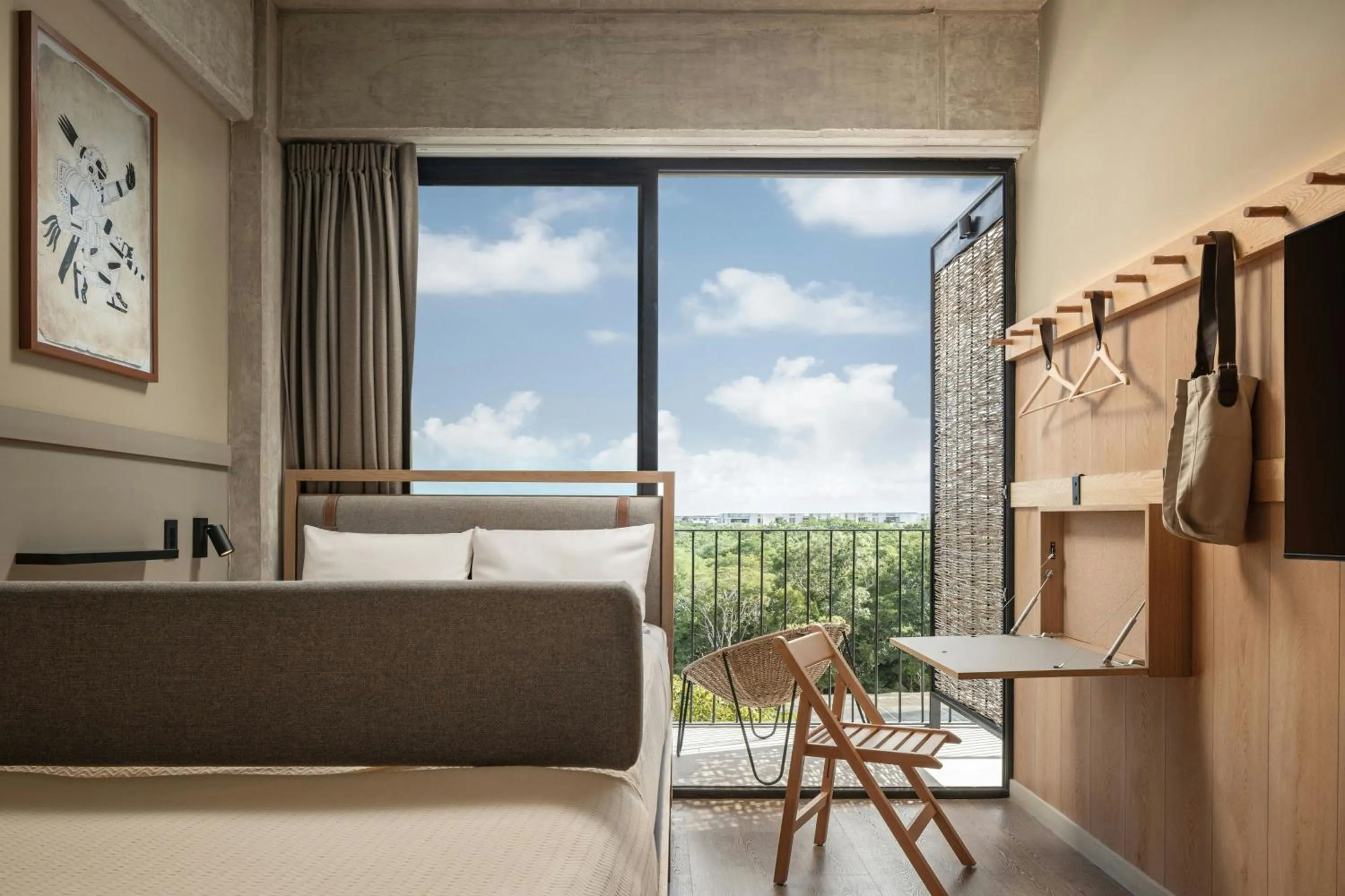 Photo of the whole room, Bed in Moxy Tulum